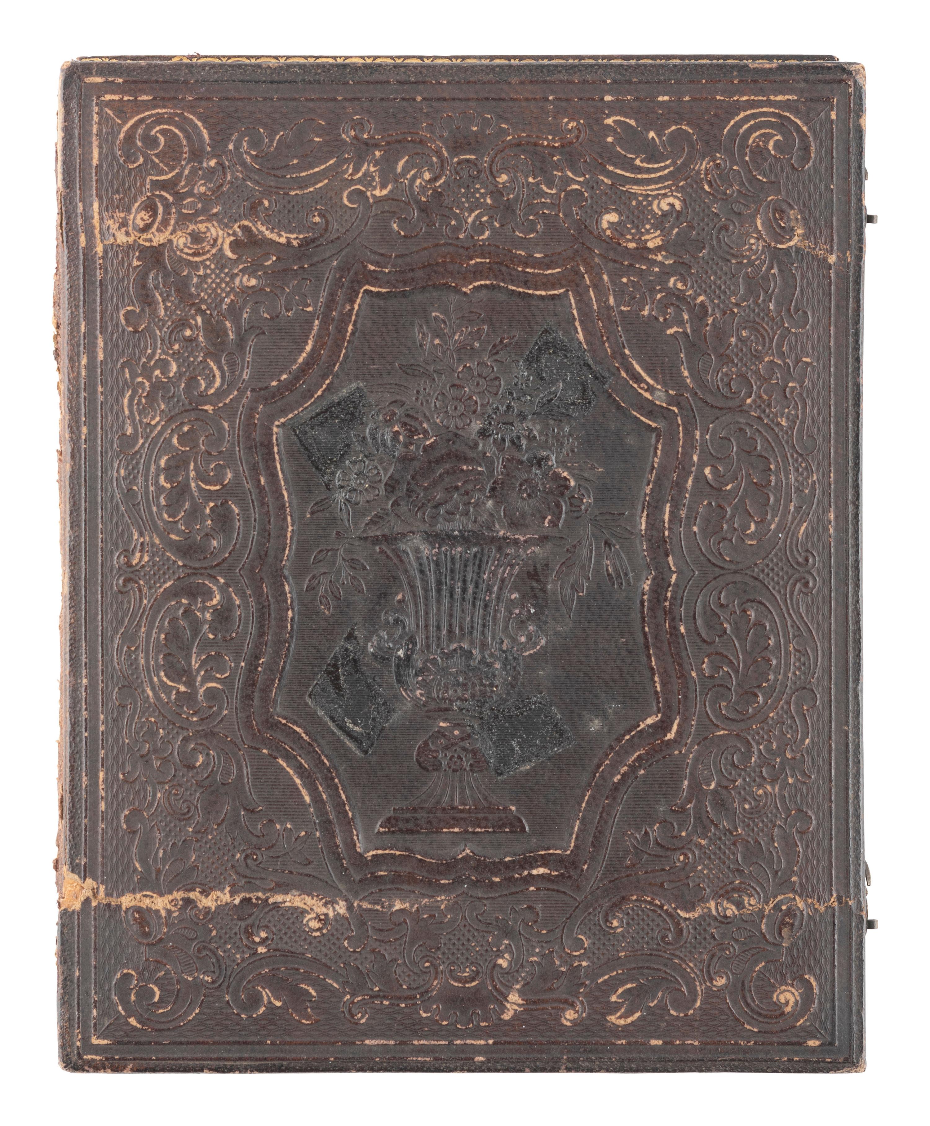 [EARLY PHOTOGRAPHY]. Two daguerreotypes of families, incl. oversized portrait by McClees and Germon, Philadelphia.