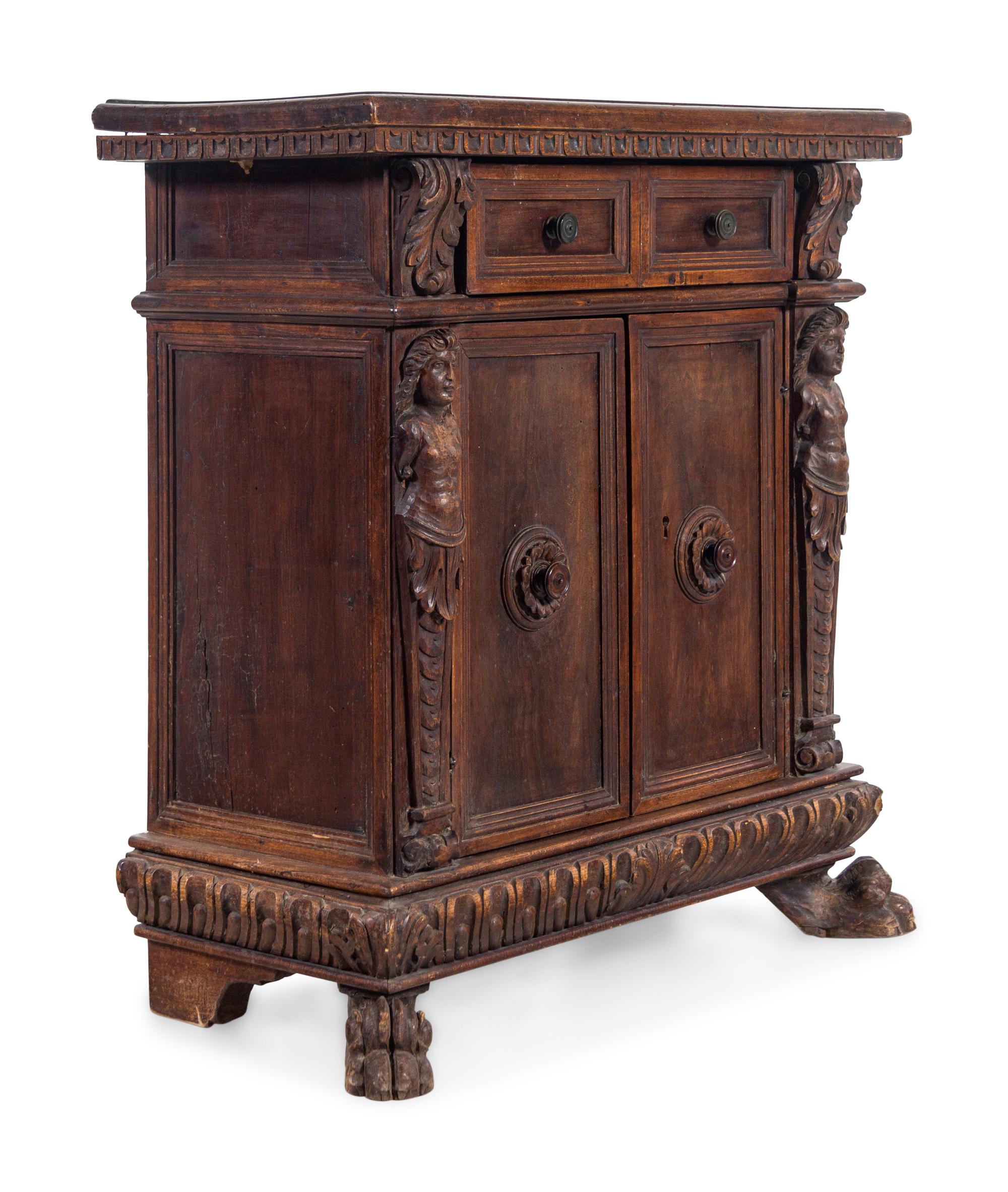 An Italian Baroque Walnut Cabinet