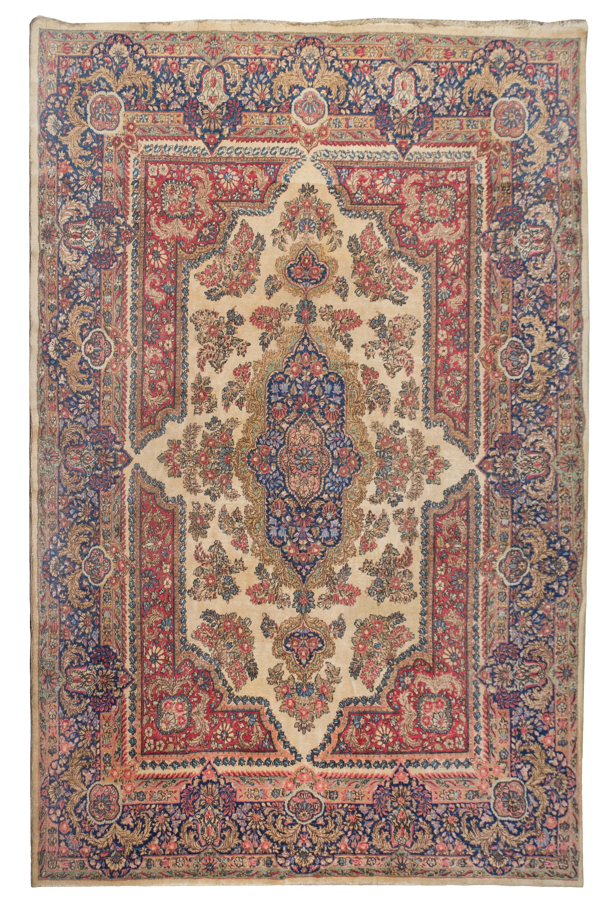 A Kirman Wool Rug, 12 feet 4 inches x 8 feet 9 inches.