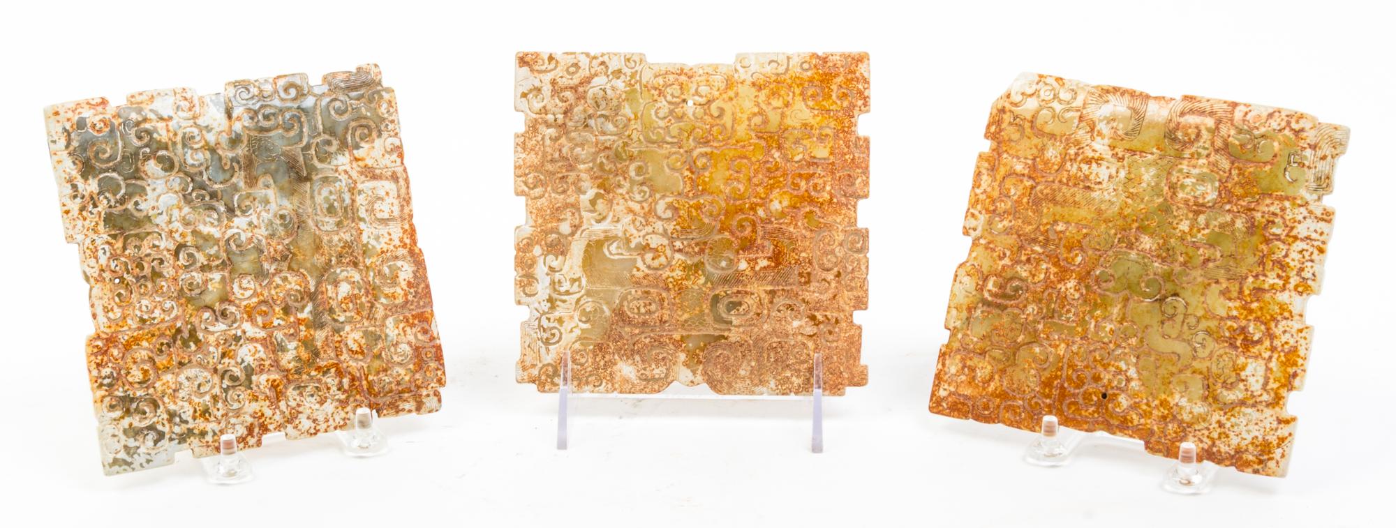 A Group of Three Archaistic Jade Plaques Width of widest 5 3/8 inches.