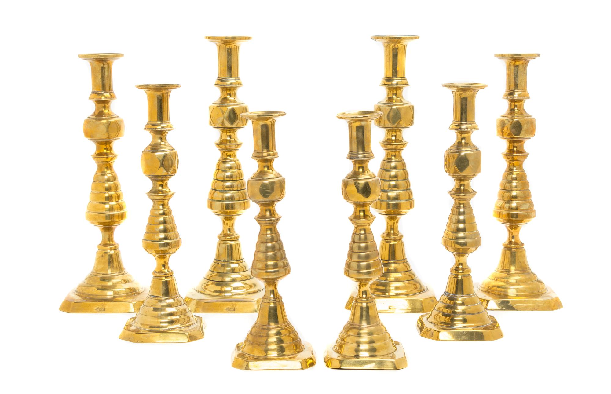 Four Pairs of English Brass Diamond Beehive Candlesticks, Height of first pair 12 inches.
