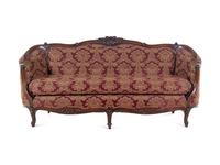 A Rococo Revival Carved Walnut Sofa