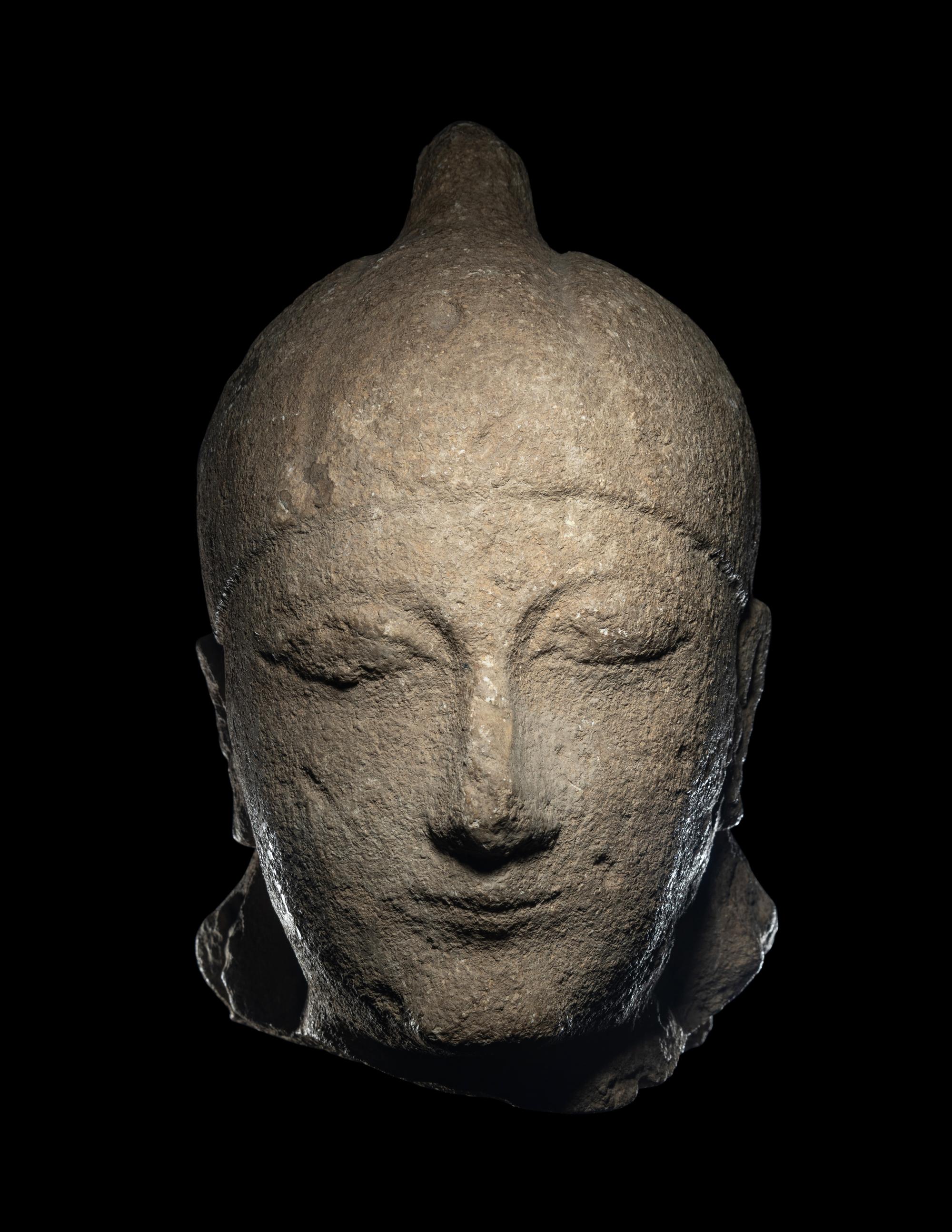 A Cypriot Limestone Head of a Male Votary