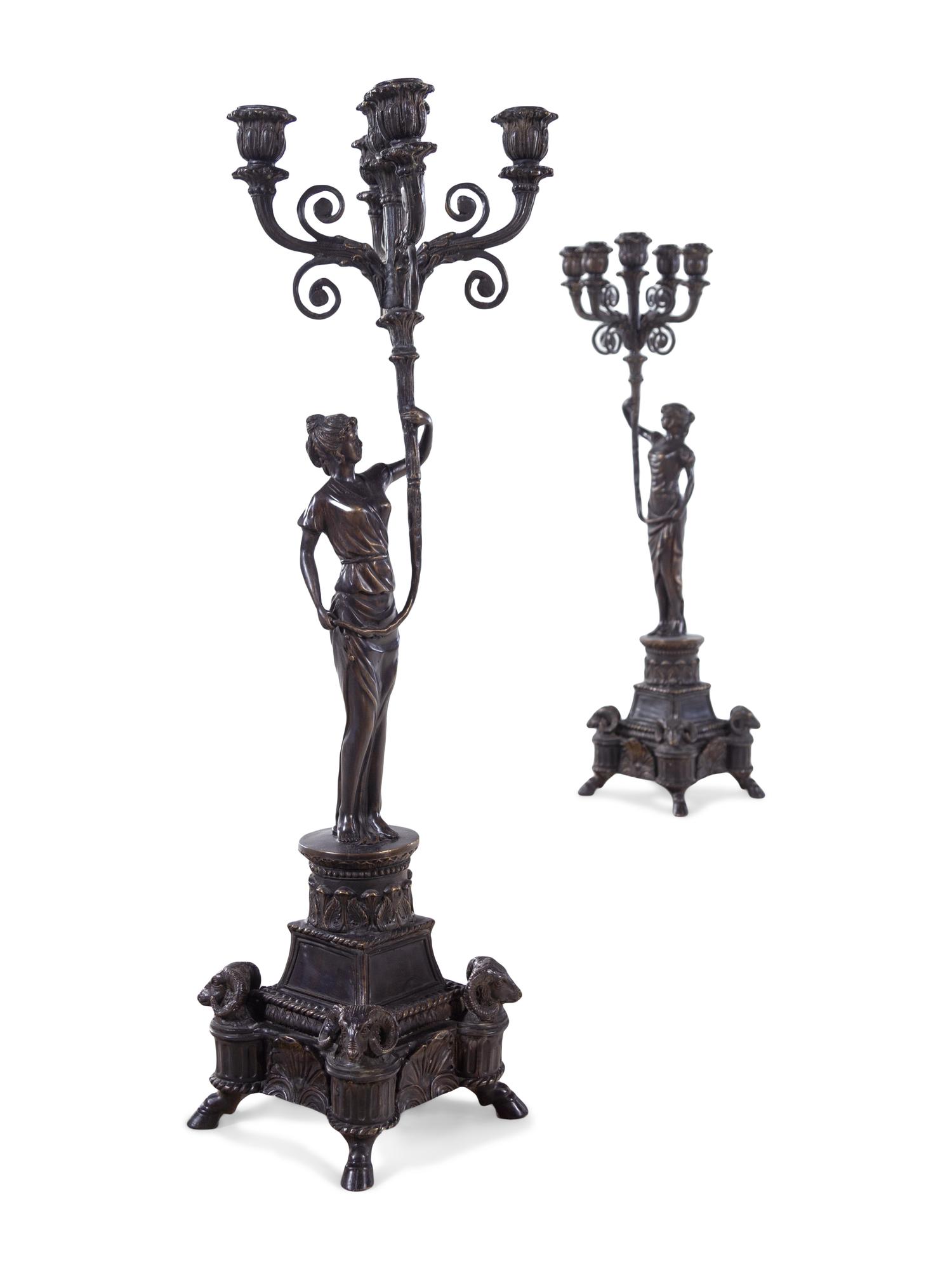 A Pair of Empire Style Silvered Metal Figural Five-Light Candelabra