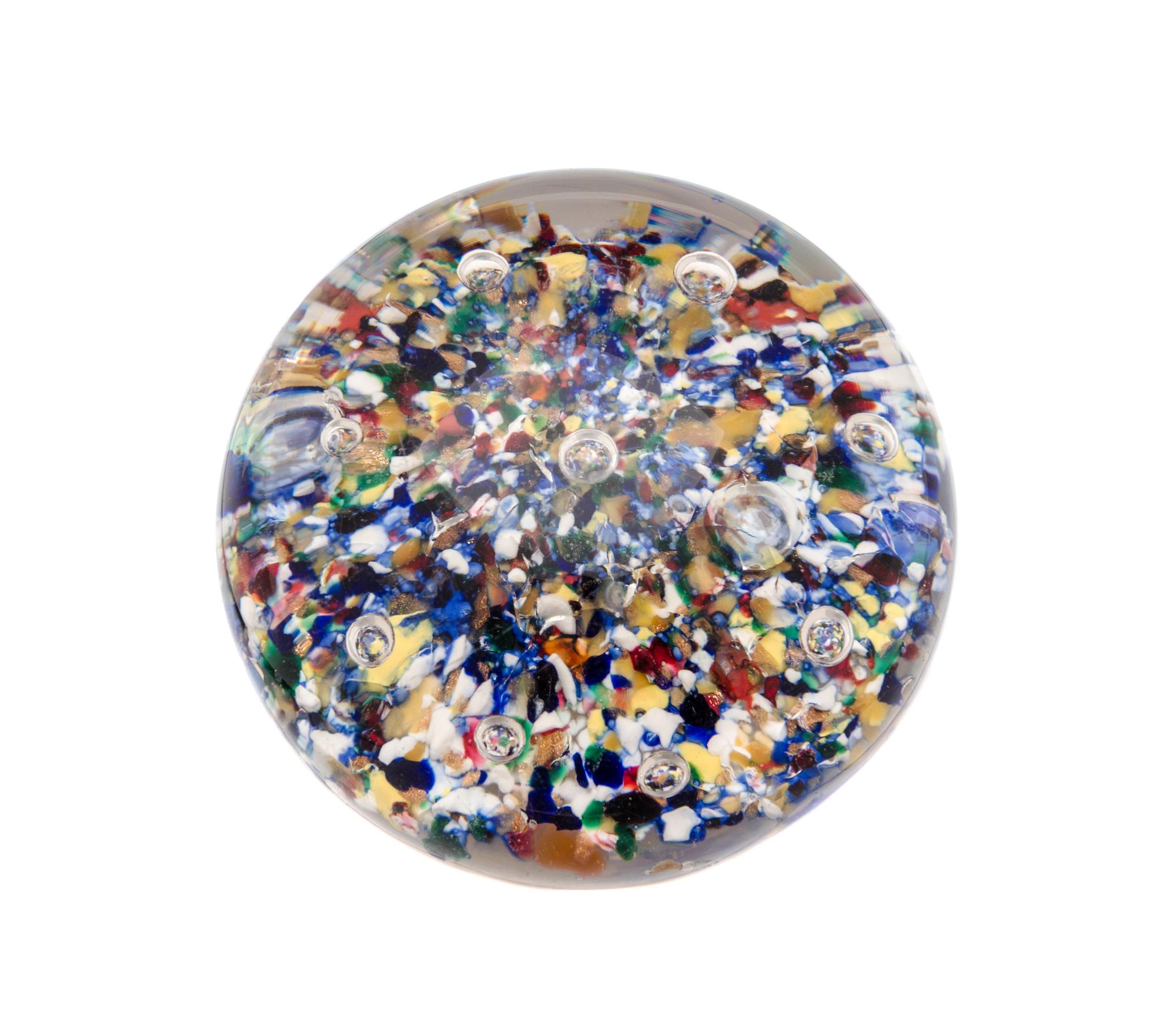 Attributed to Baccarat, , paperweight with scattered ground and bubbles