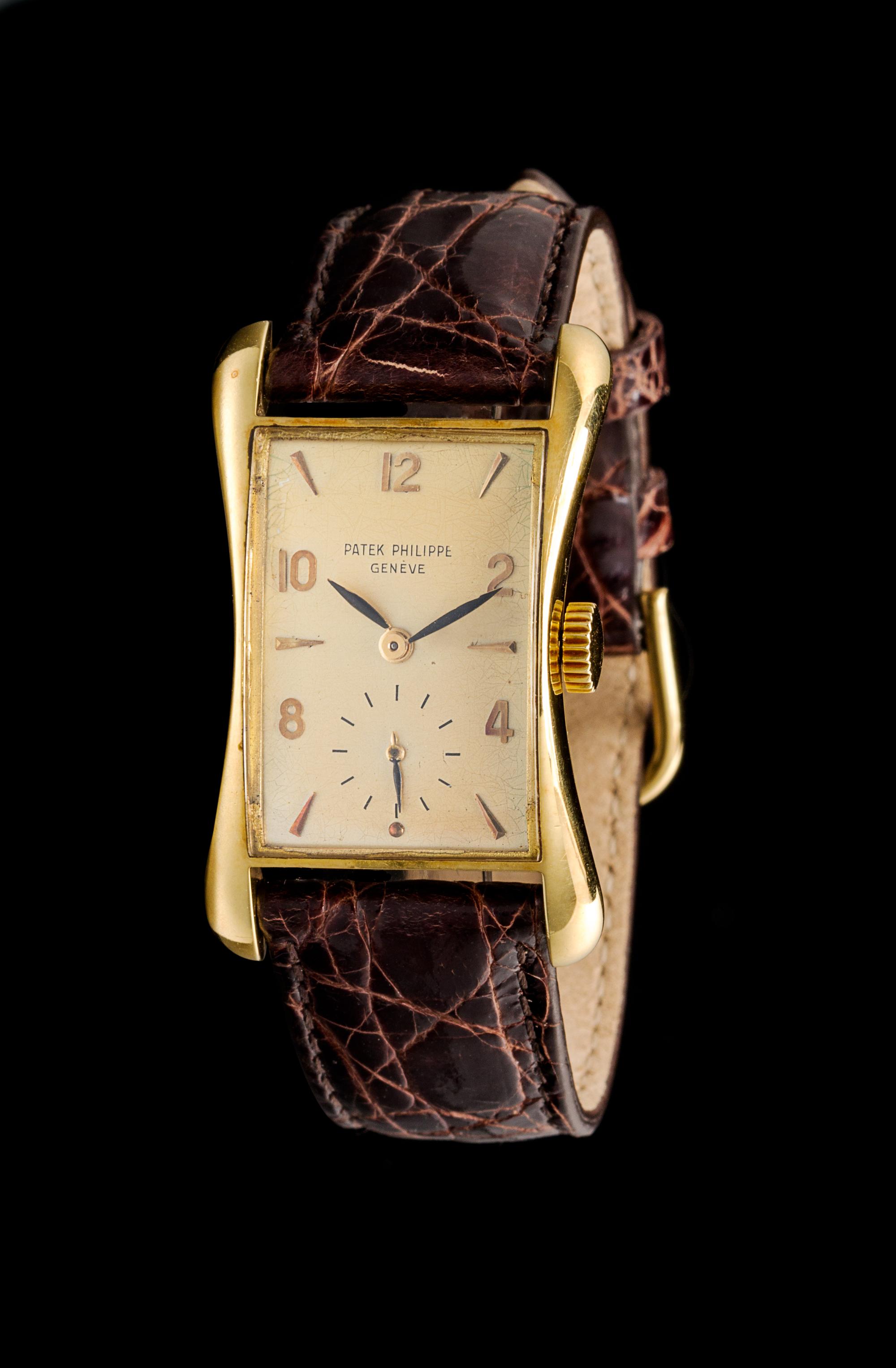An 18 Karat Yellow Gold Ref. 2442 Wristwatch, Patek Philippe, Circa 1953,