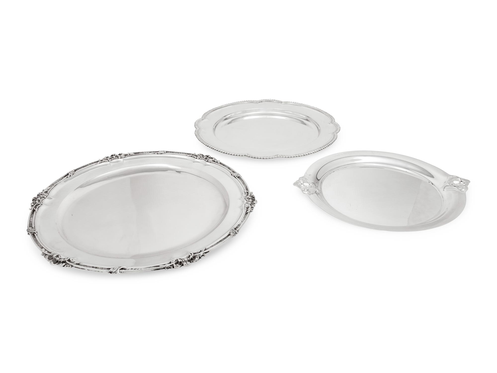 Three Silver Serving Trays