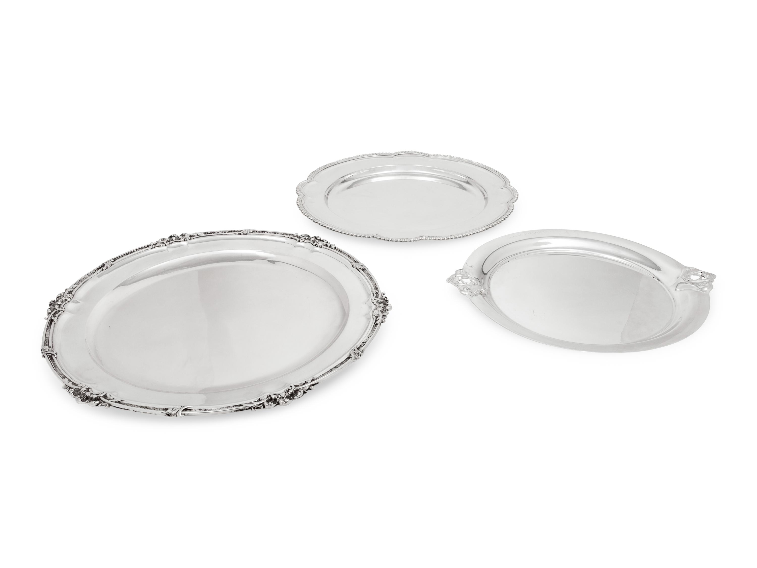 Three Silver Serving Trays