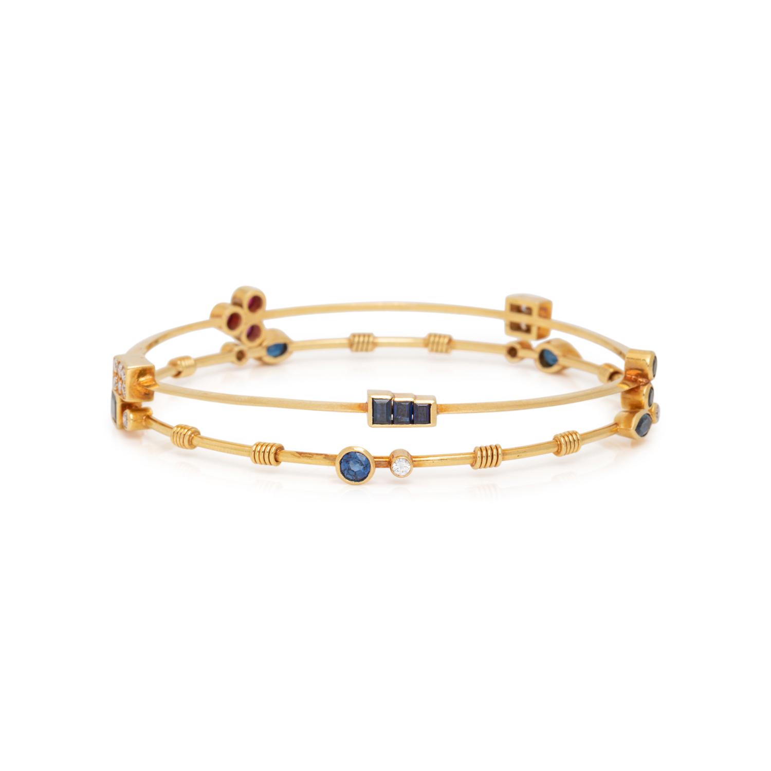 COLLECTION OF YELLOW GOLD, DIAMOND AND GEMSTONE BANGLE BRACELETS