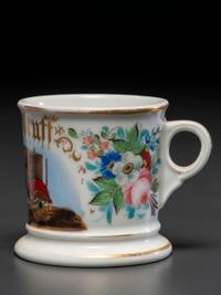 A Furniture Dealer's Porcelain Occupational Shaving Mug