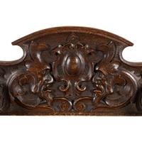 A Pair of Italian Carved Walnut Savonarola Chairs