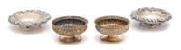 Two Pairs of American Silver Footed Salts, J. E. Caldwell, Philadelphia, PA, one pair with gadrooned rim, the other with chased scroll