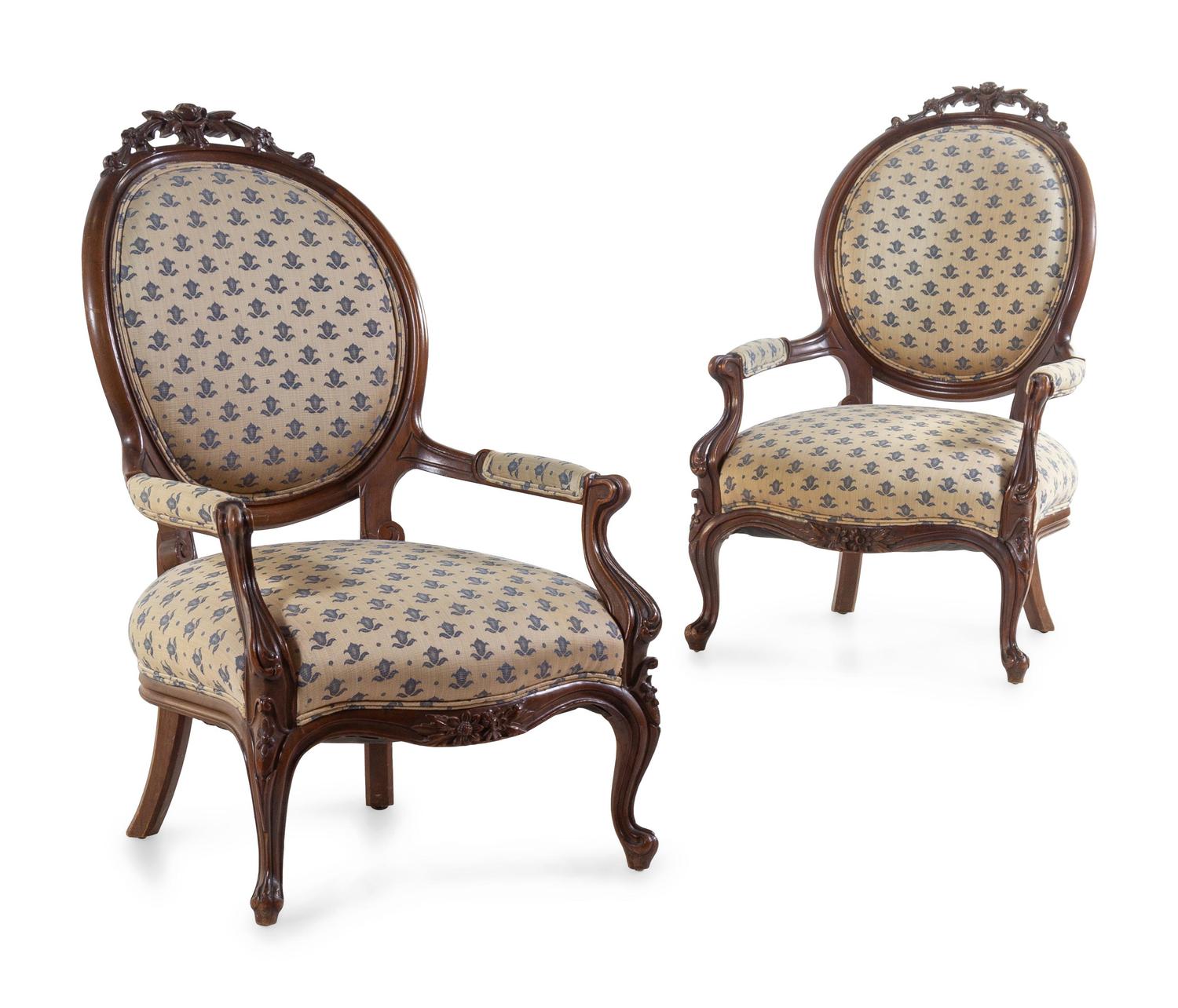 A Pair of Rococo Revival Carved Mahogany Fauteuils