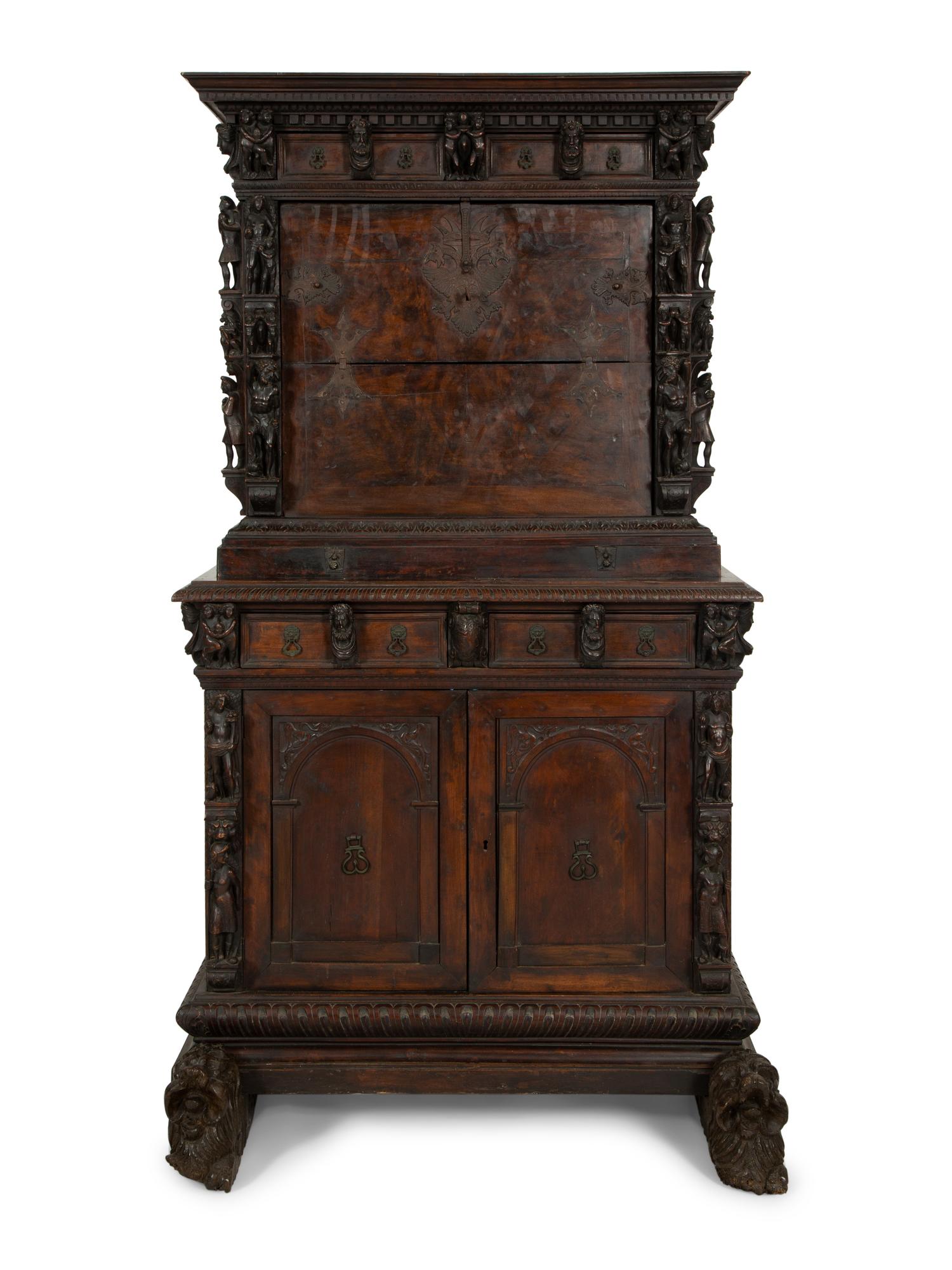 A Continental Baroque Walnut Cabinet