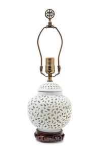 A Chinese White Glazed Porcelain Reticulated Covered Jar