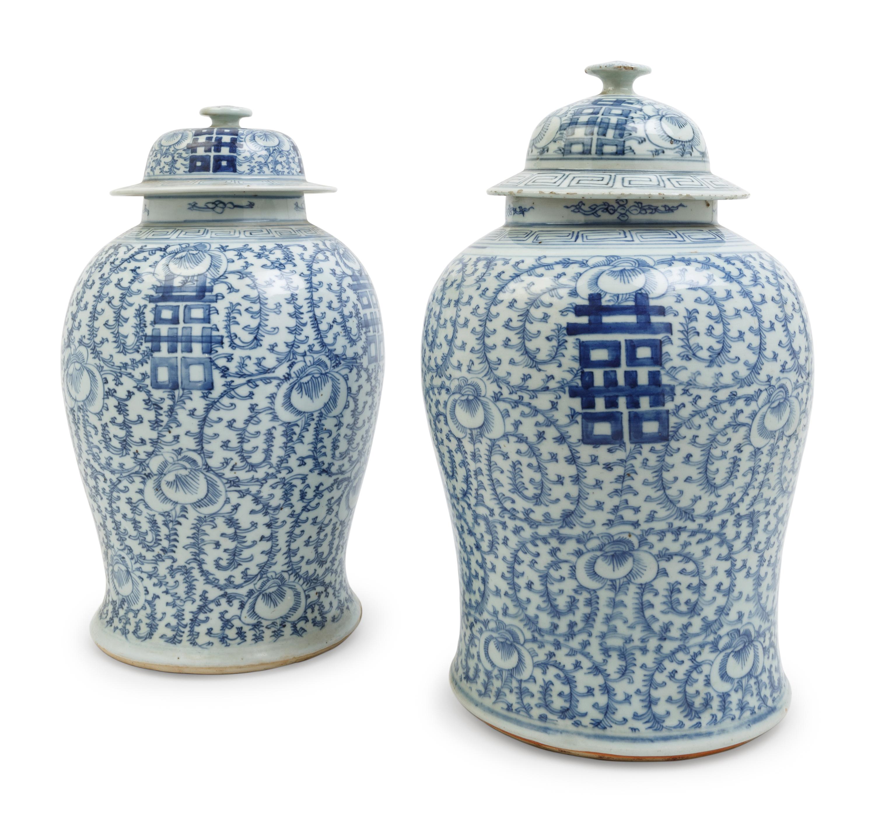 A Pair of Chinese Blue and White Porcelain Jars and Covers