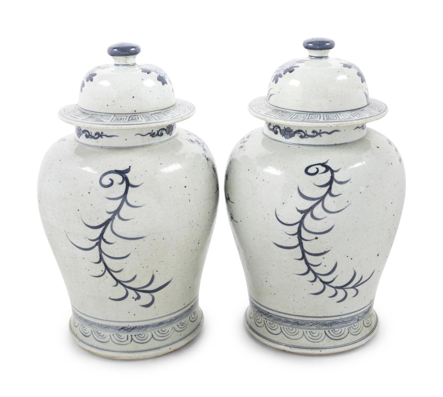 Two Pairs of Chinese Blue and White Porcelain Jars and Covers