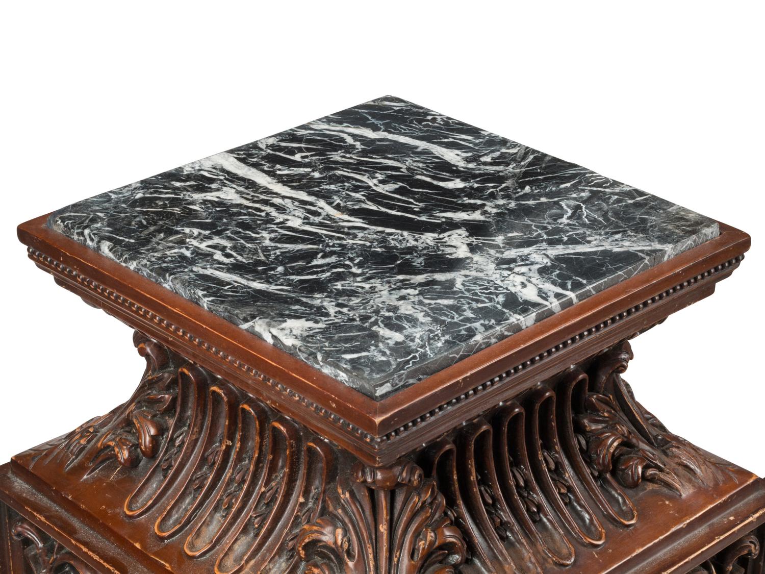 A Pair of Italian Baroque Style Carved Wood Marble-Top Pedestals