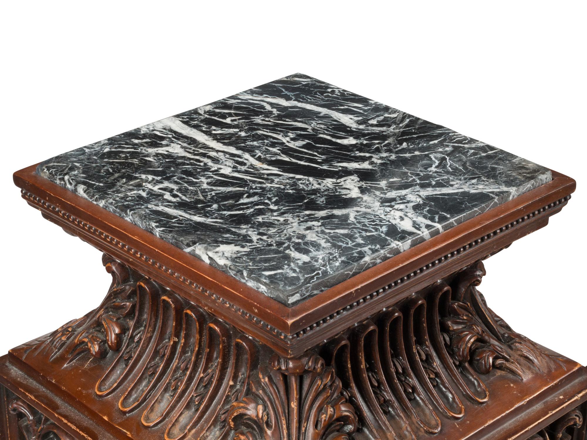 A Pair of Italian Baroque Style Carved Wood Marble-Top Pedestals