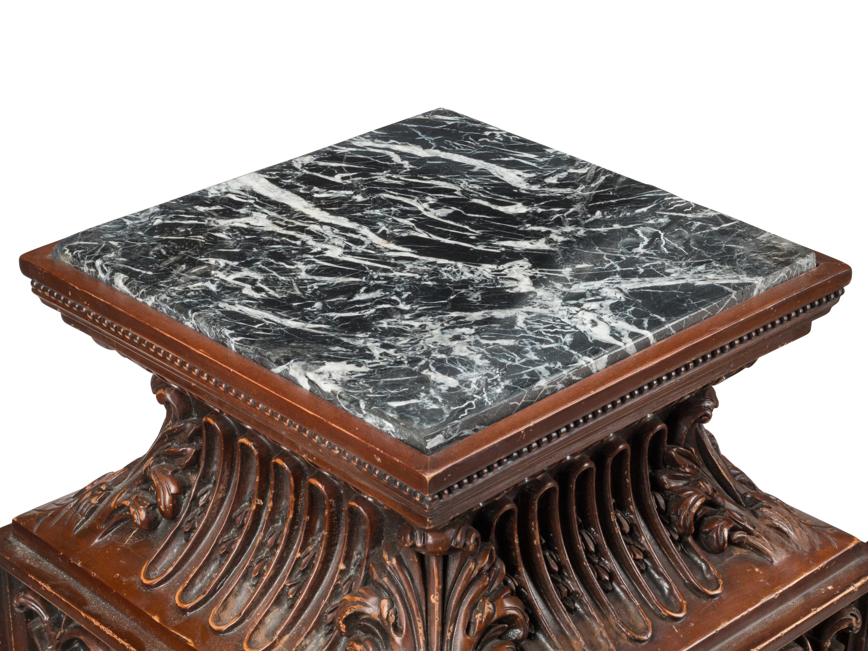 A Pair of Italian Baroque Style Carved Wood Marble-Top Pedestals