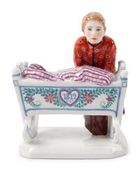 A Meissen Porcelain Figural Group of a Woman with Cradle