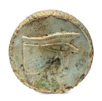 An Egyptian Faience Two-Sided Medallion