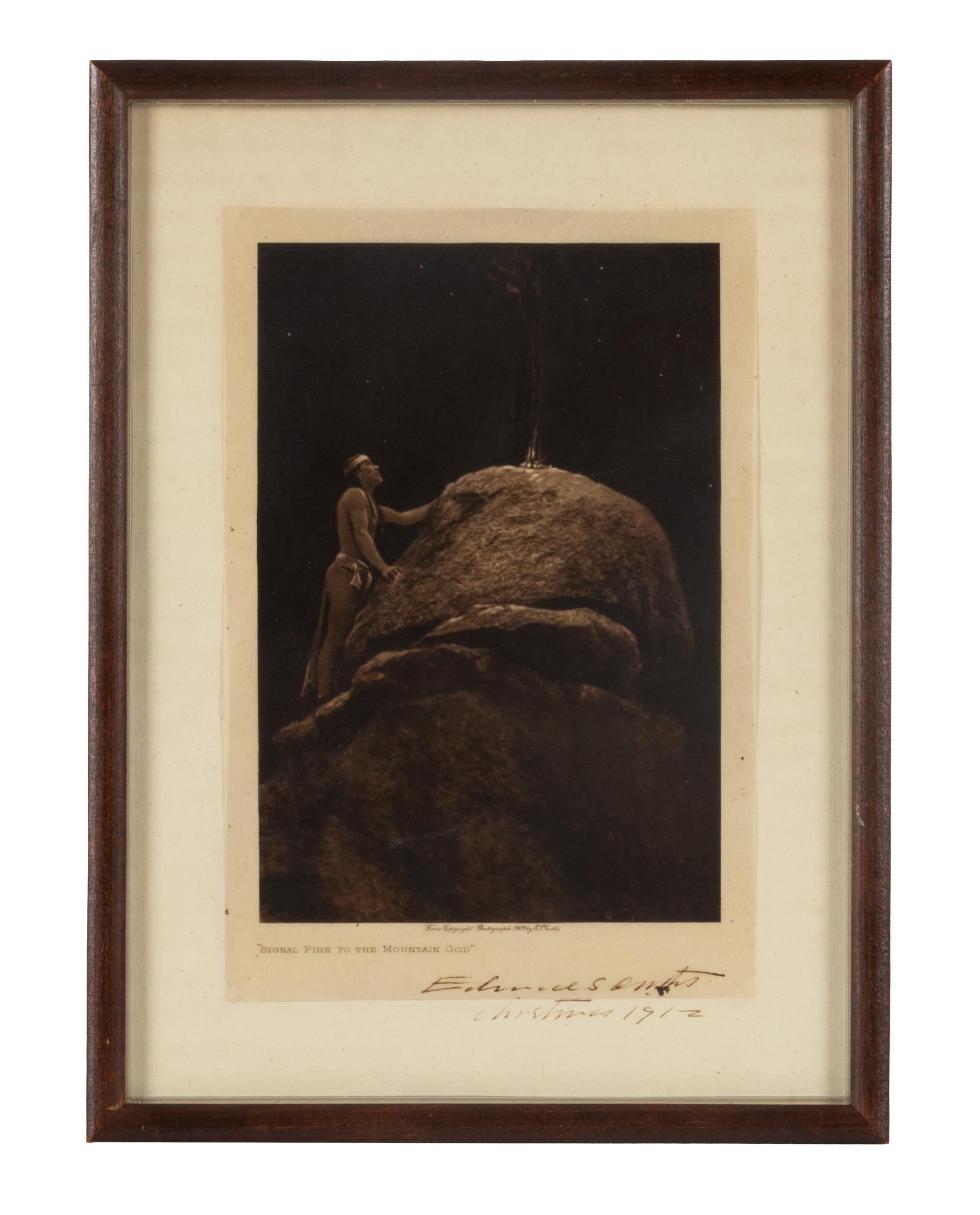 CURTIS, Edward S. (1868-1952), photographer. Signal Fire to the Mountain Gods . Signed and inscribed by Curtis.