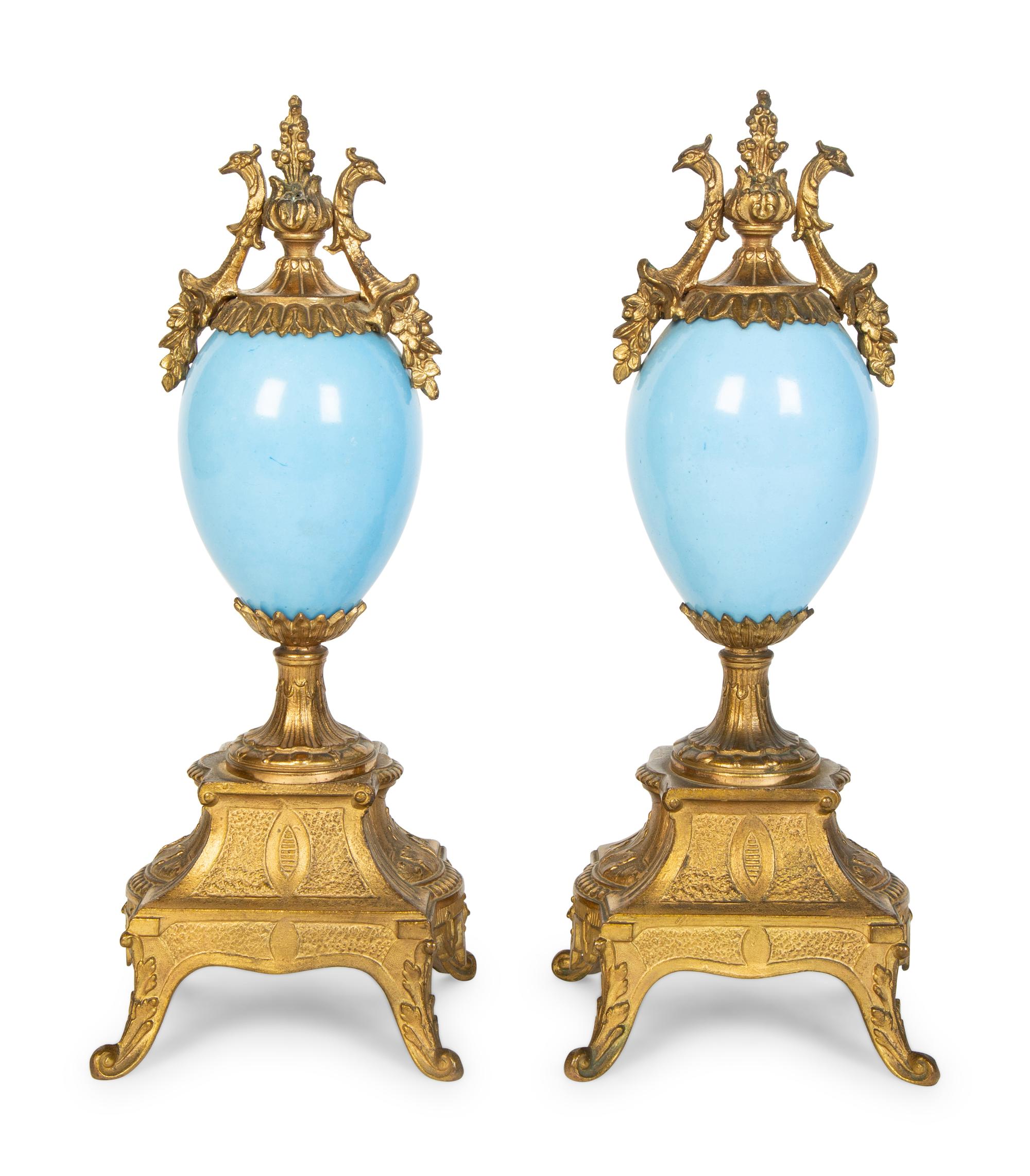 A Pair of Sèvres Style Porcelain Small Urns with Gilt Metal Mounts