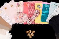 Collection of 73 Chanel Buttons, Fabric Swatches, and Ribbons, 1980-2010s