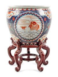 A Chinese Export Porcelain Fishbowl and Wood Stand
