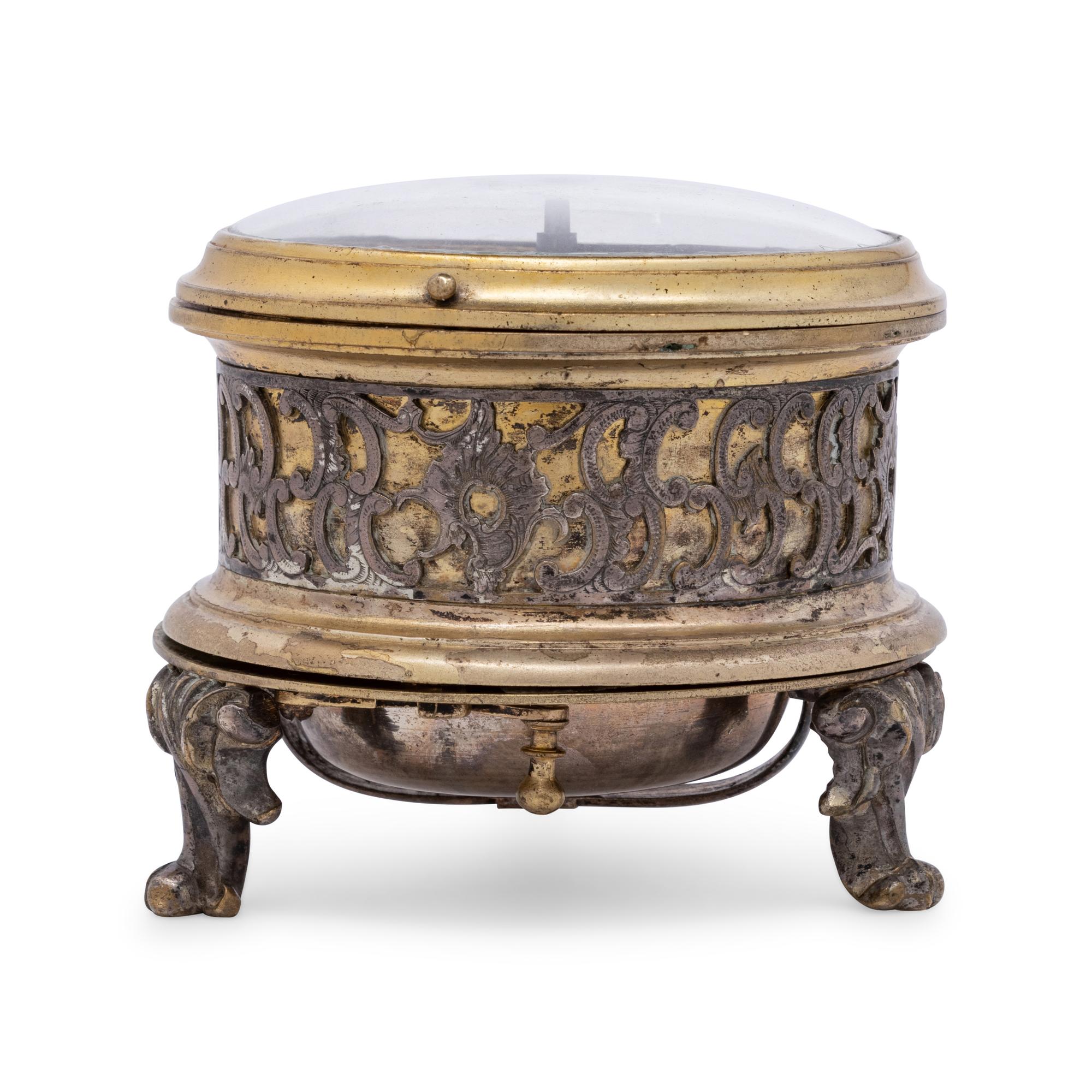 A German Gilt Metal and Silvered Brass Table Clock