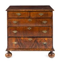 A George II Satinwood-Inlaid Walnut Chest of Drawers