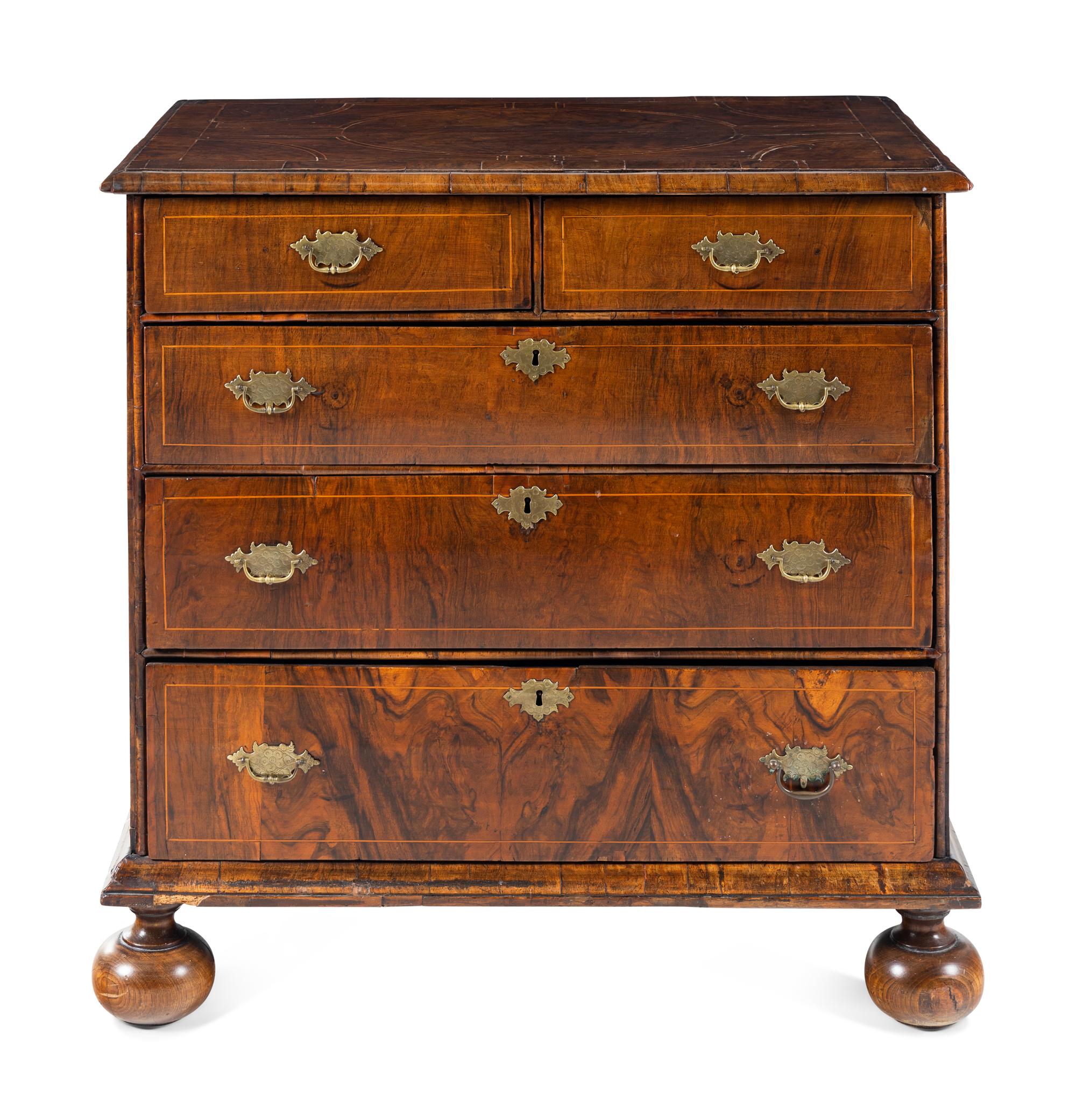 A George II Satinwood-Inlaid Walnut Chest of Drawers