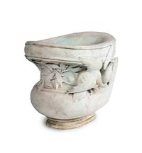 A Carved Variegated Marble Jardinière