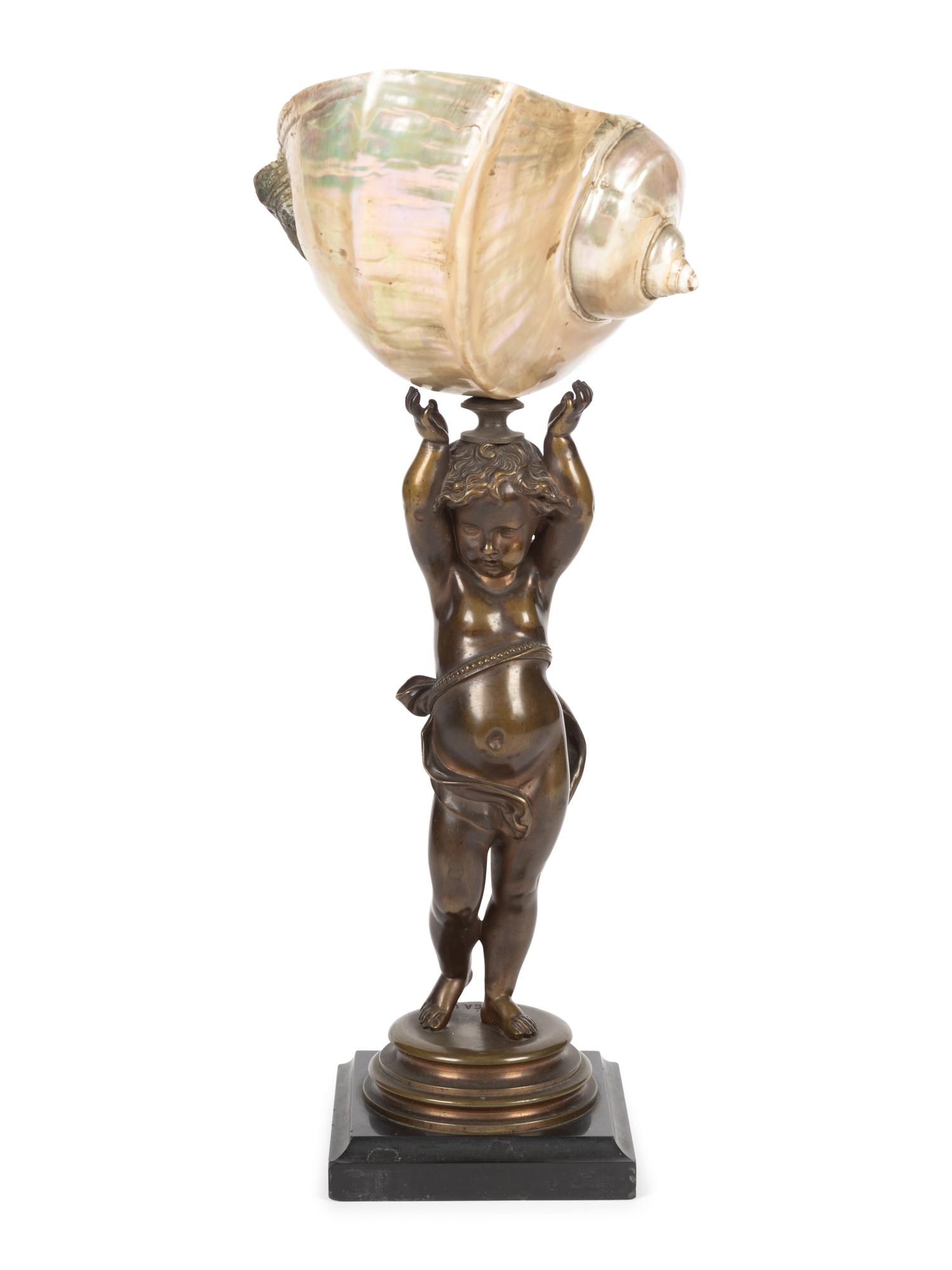 A Continental Bronze and Nautilus Shell Table Ornament