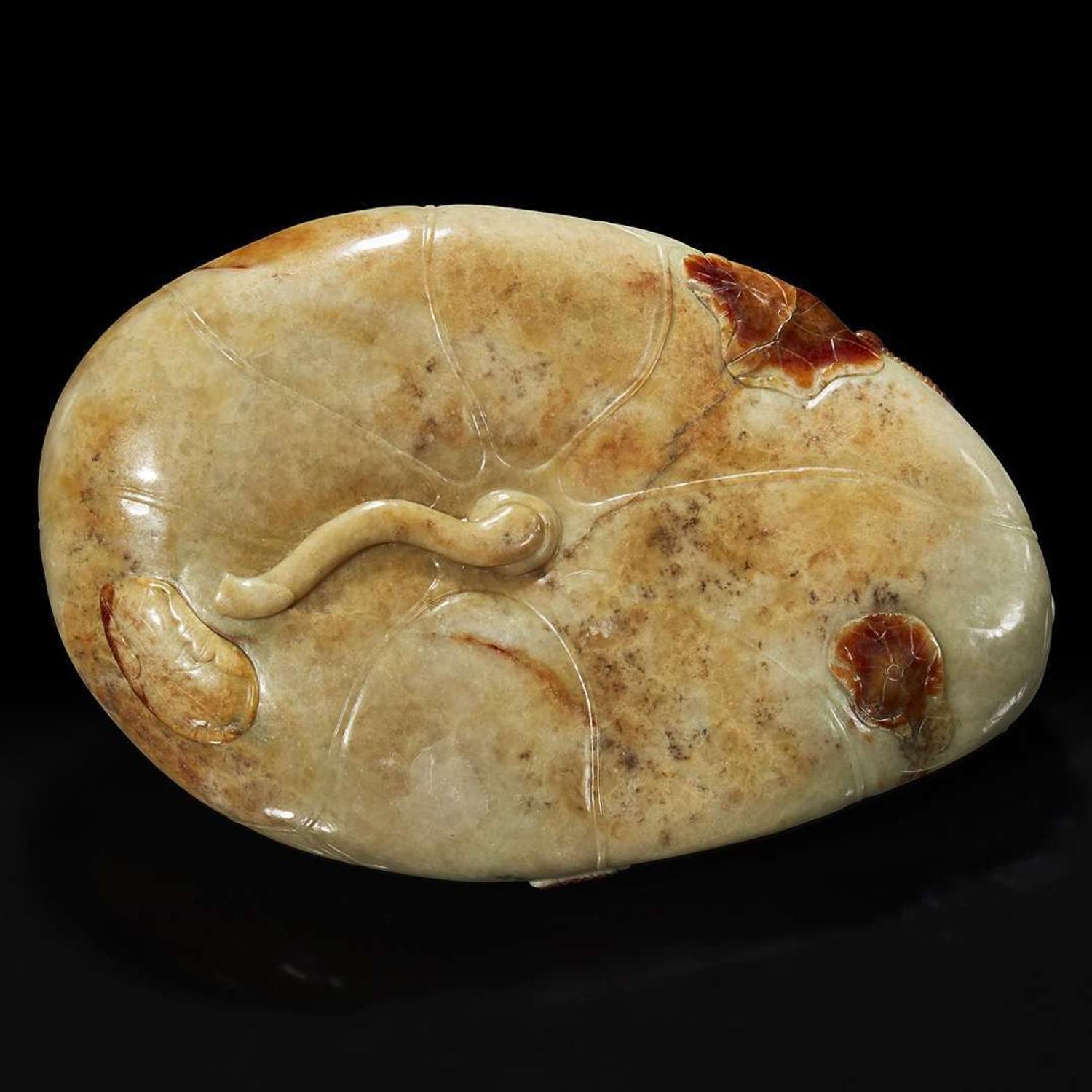 A Chinese carved russet and beige jade "Lotus Leaf" brush washer 赤褐色沁灰玉莲叶水洗