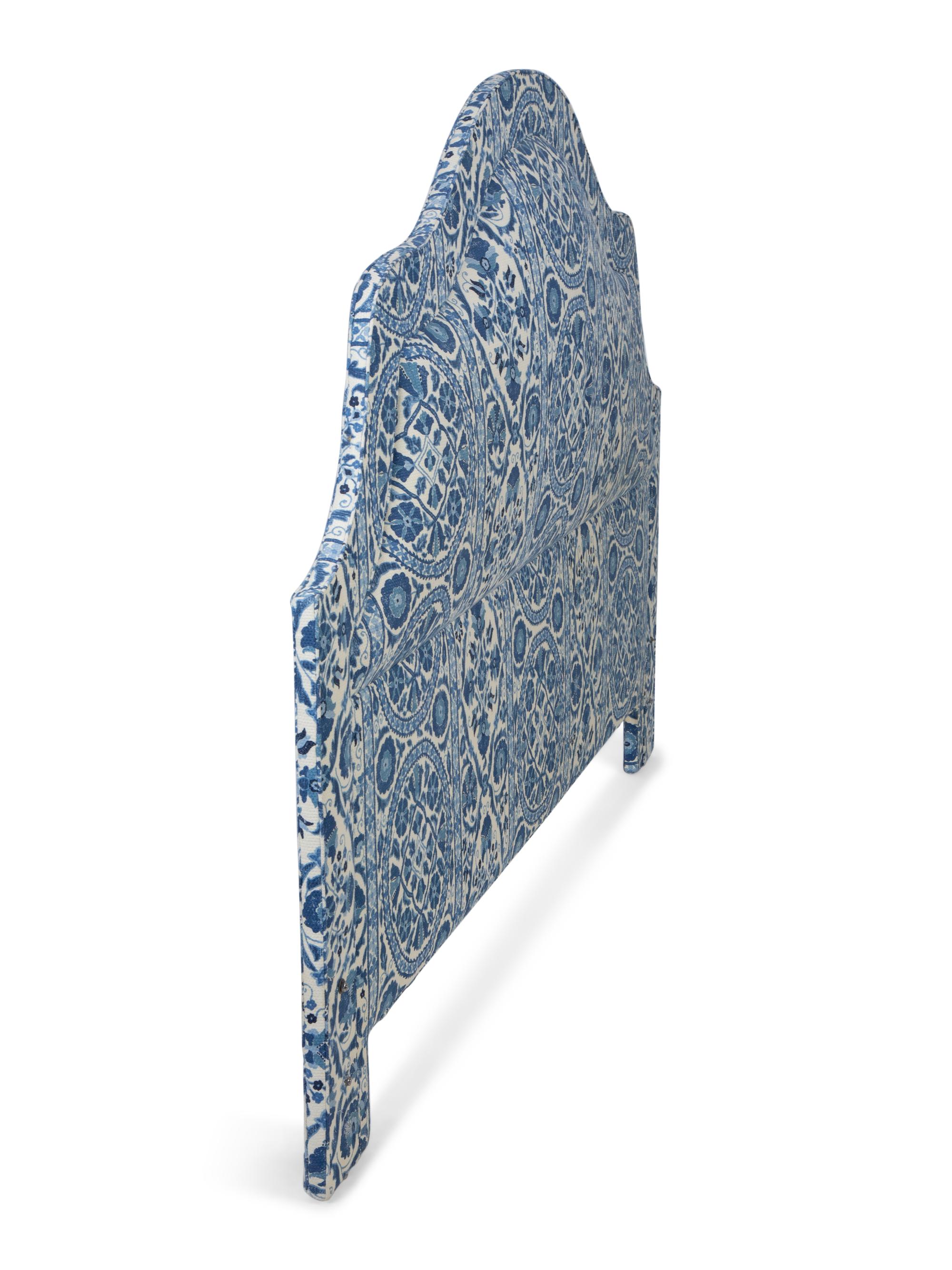 An Arched Upholstered Headboard — 20TH CENTURY
