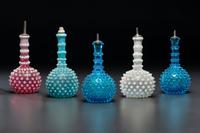 Five Hobnail Glass Barber Bottles