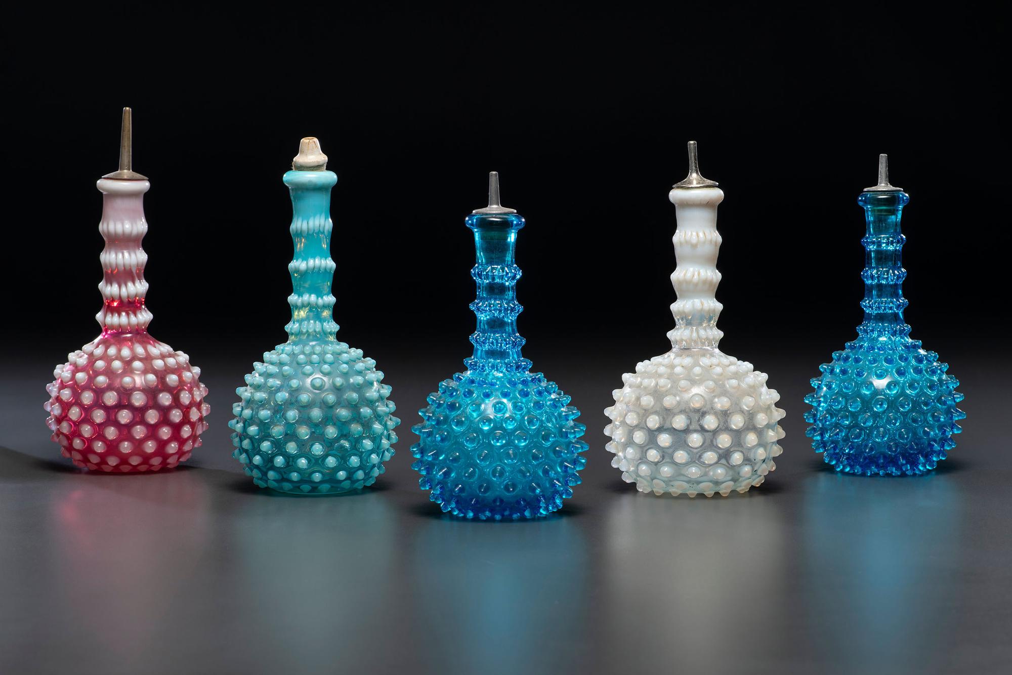 Five Hobnail Glass Barber Bottles