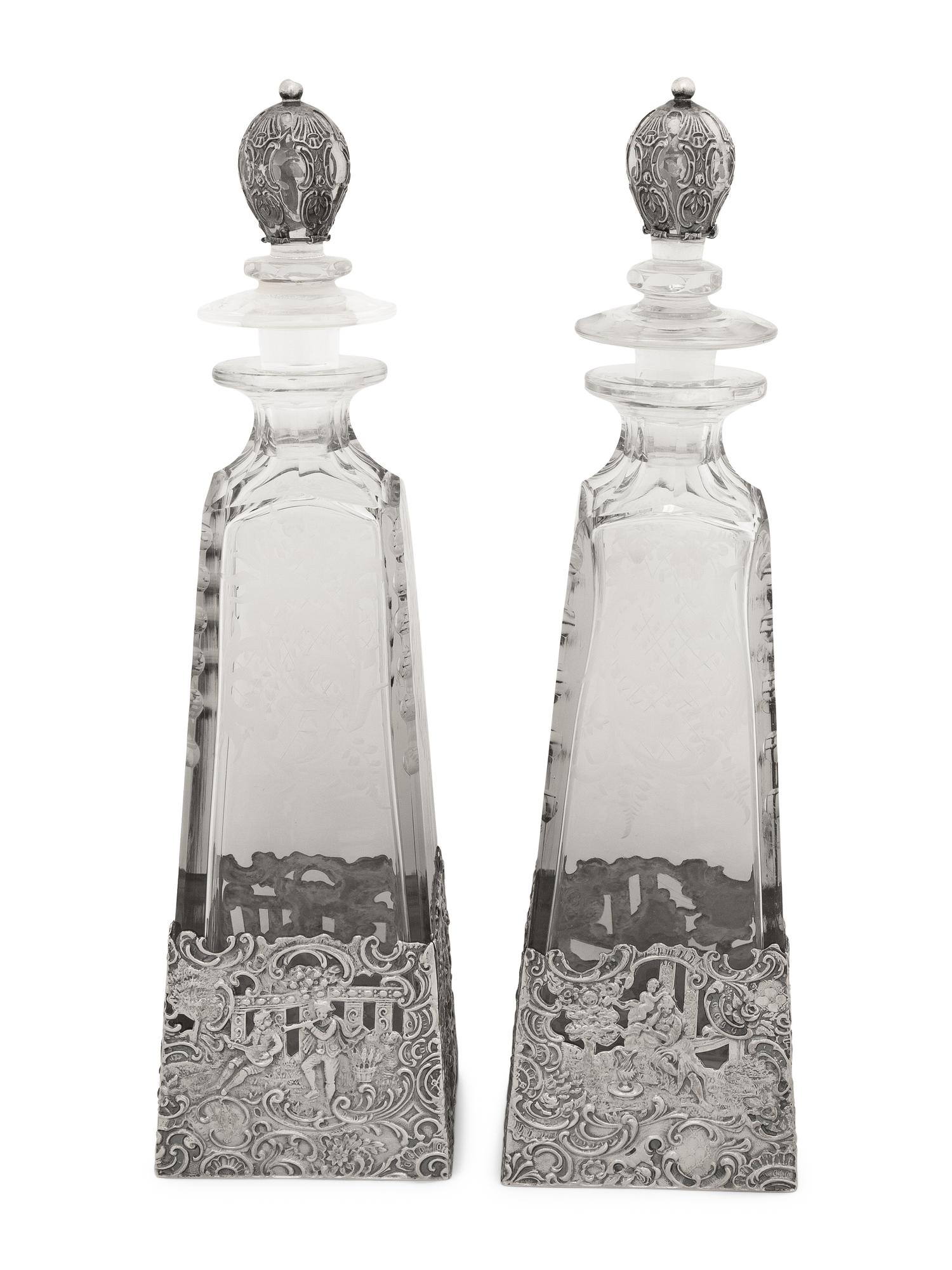 A Pair of American Silver Mounted Etched Glass Decanters
