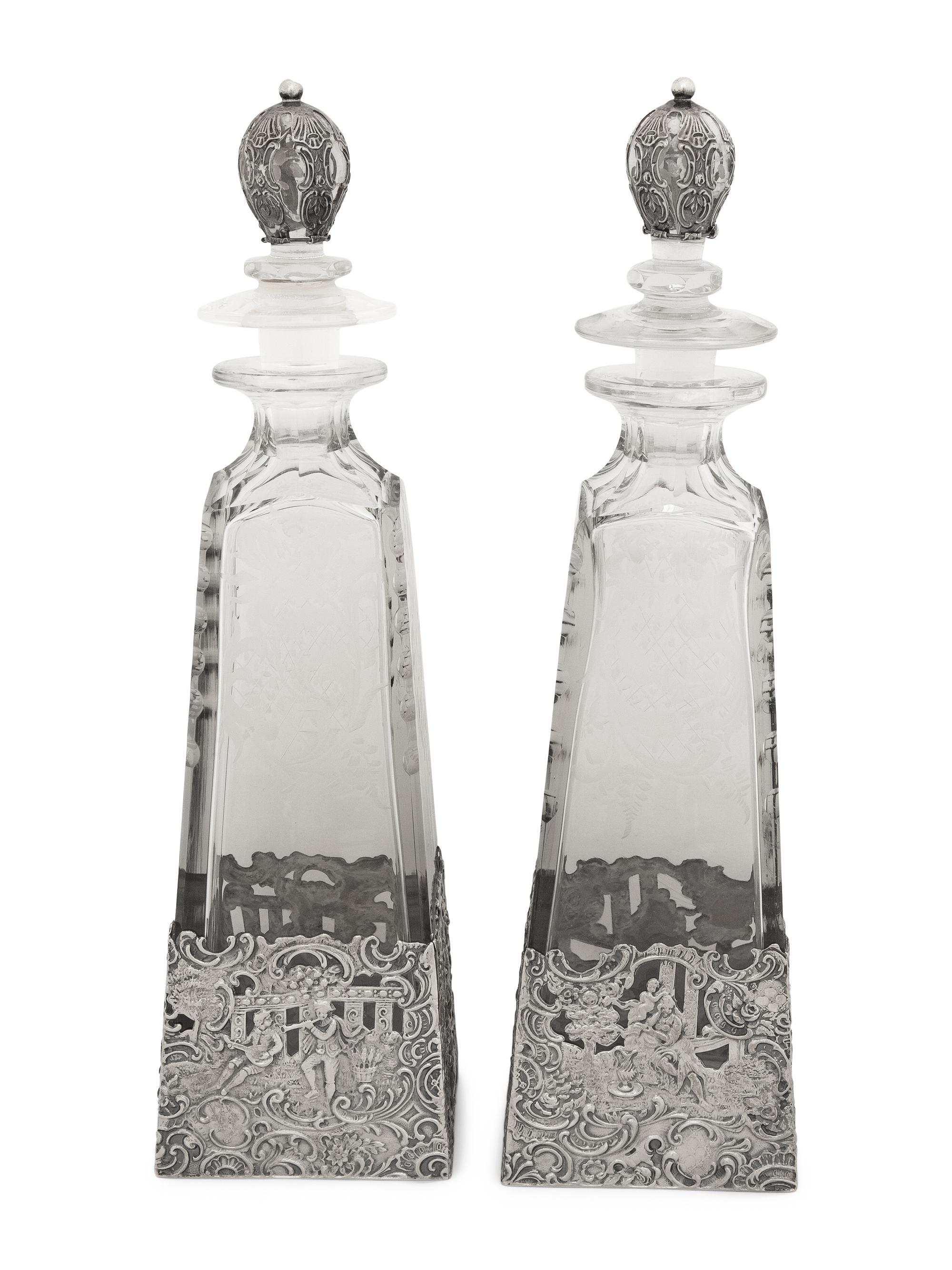 A Pair of American Silver Mounted Etched Glass Decanters