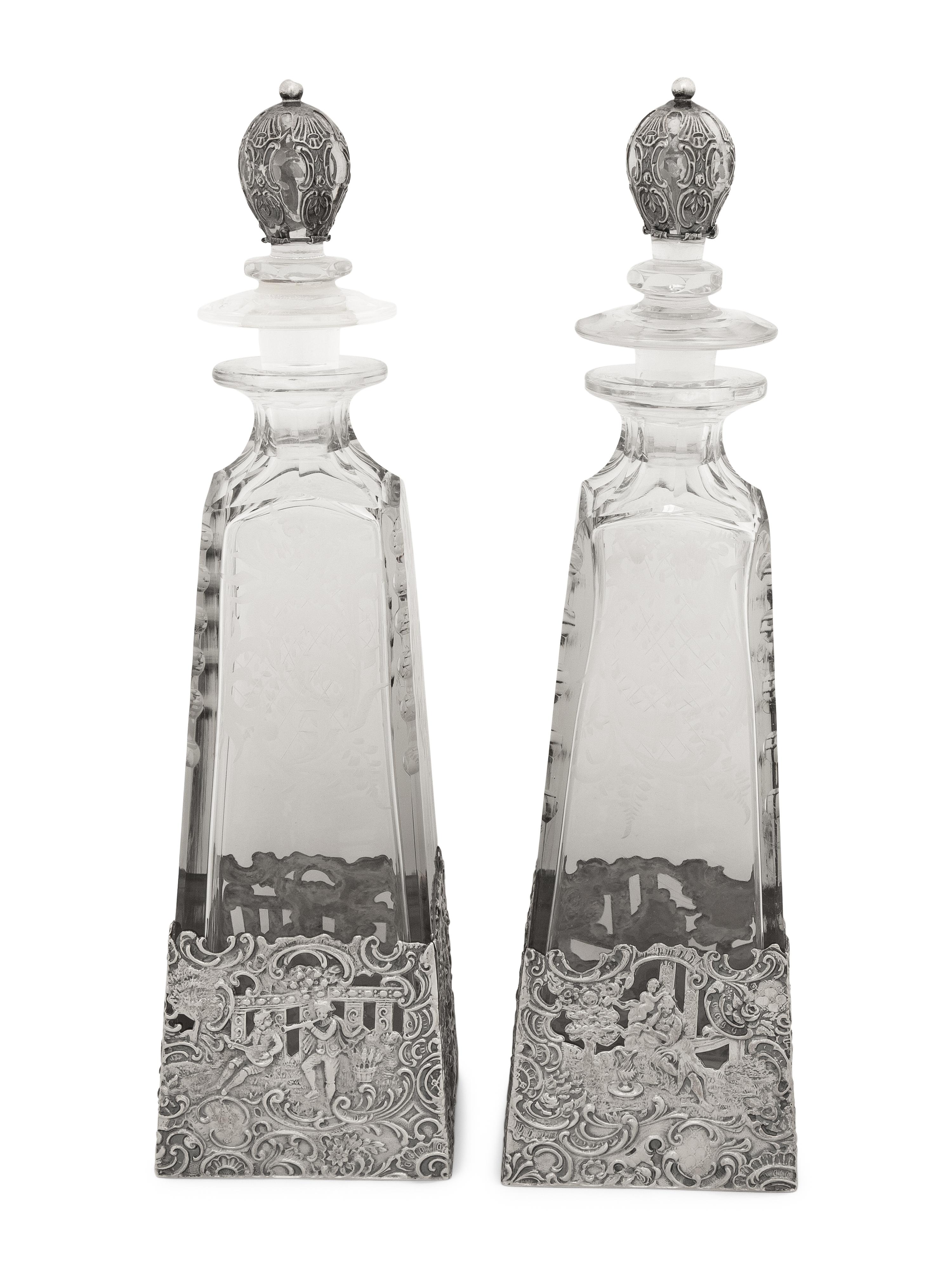 A Pair of American Silver Mounted Etched Glass Decanters