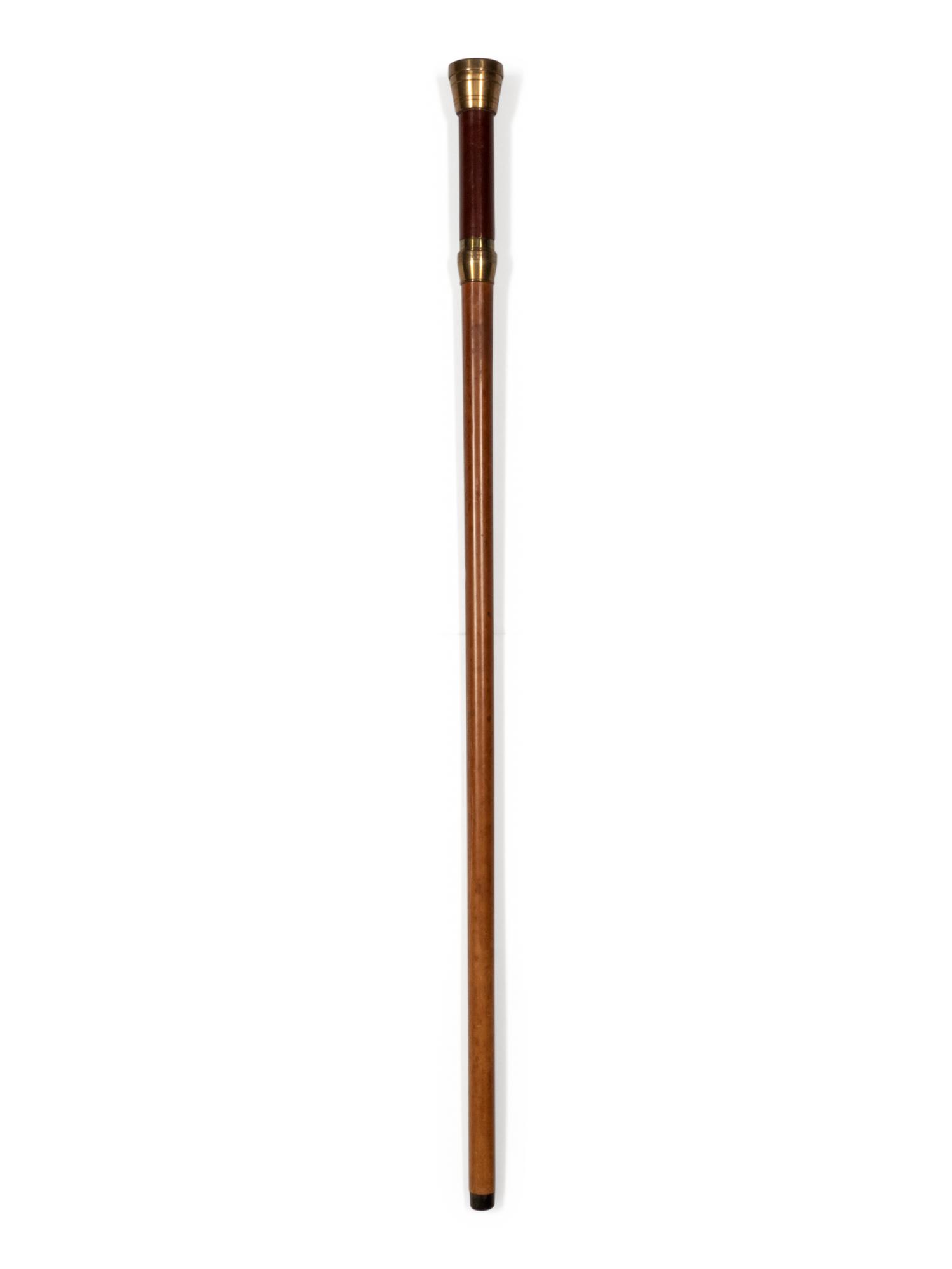 A Brass and Mahogany Mounted Malacca Ship's Captain 'System' Walking Stick