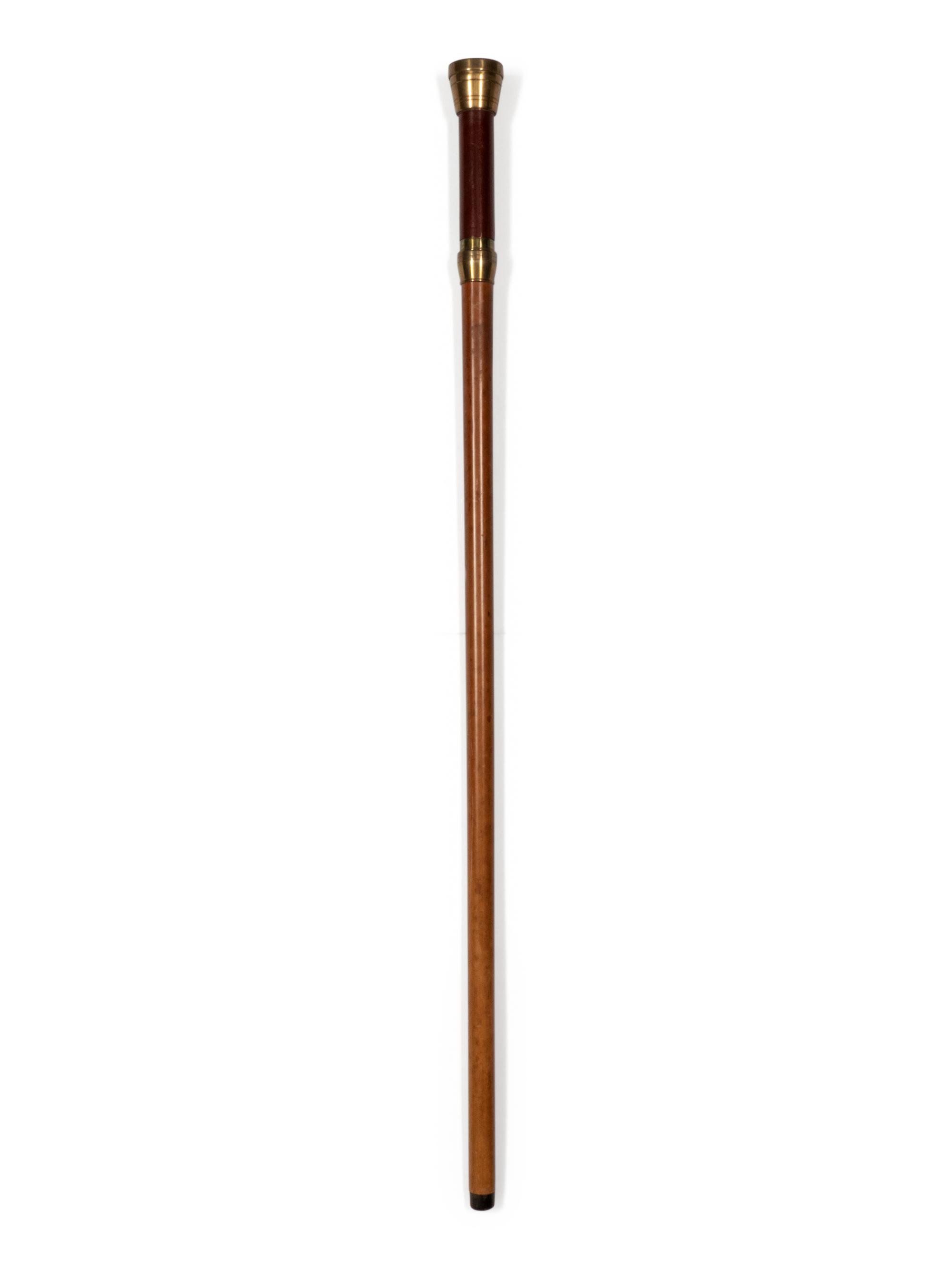A Brass and Mahogany Mounted Malacca Ship's Captain 'System' Walking Stick