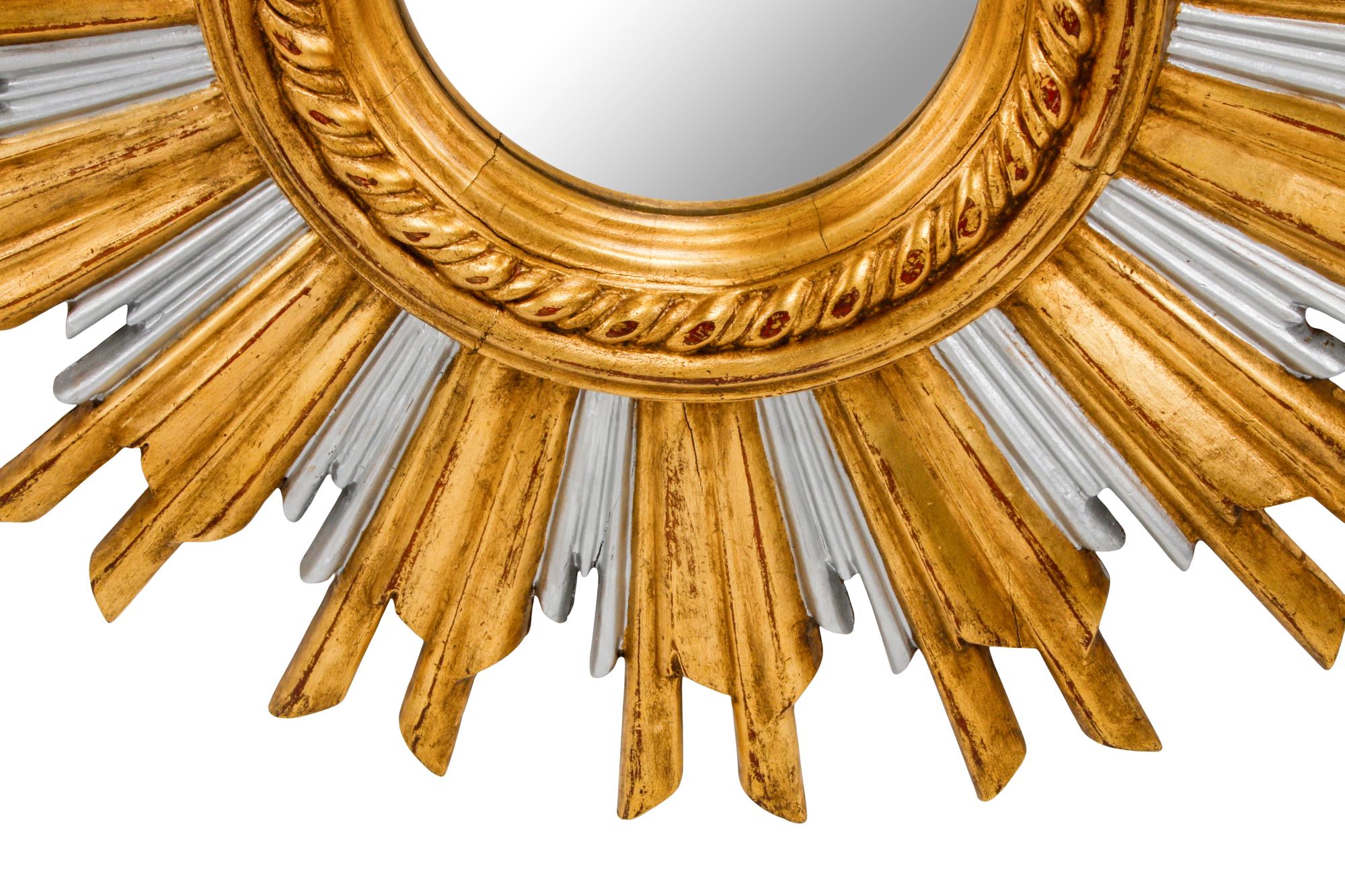 A Pair of Italian Giltwood Sunburst Mirrors
