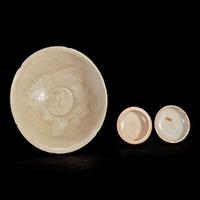 A Chinese small crackle-glaze circular box and a Chinese incised bowl Song dynasty