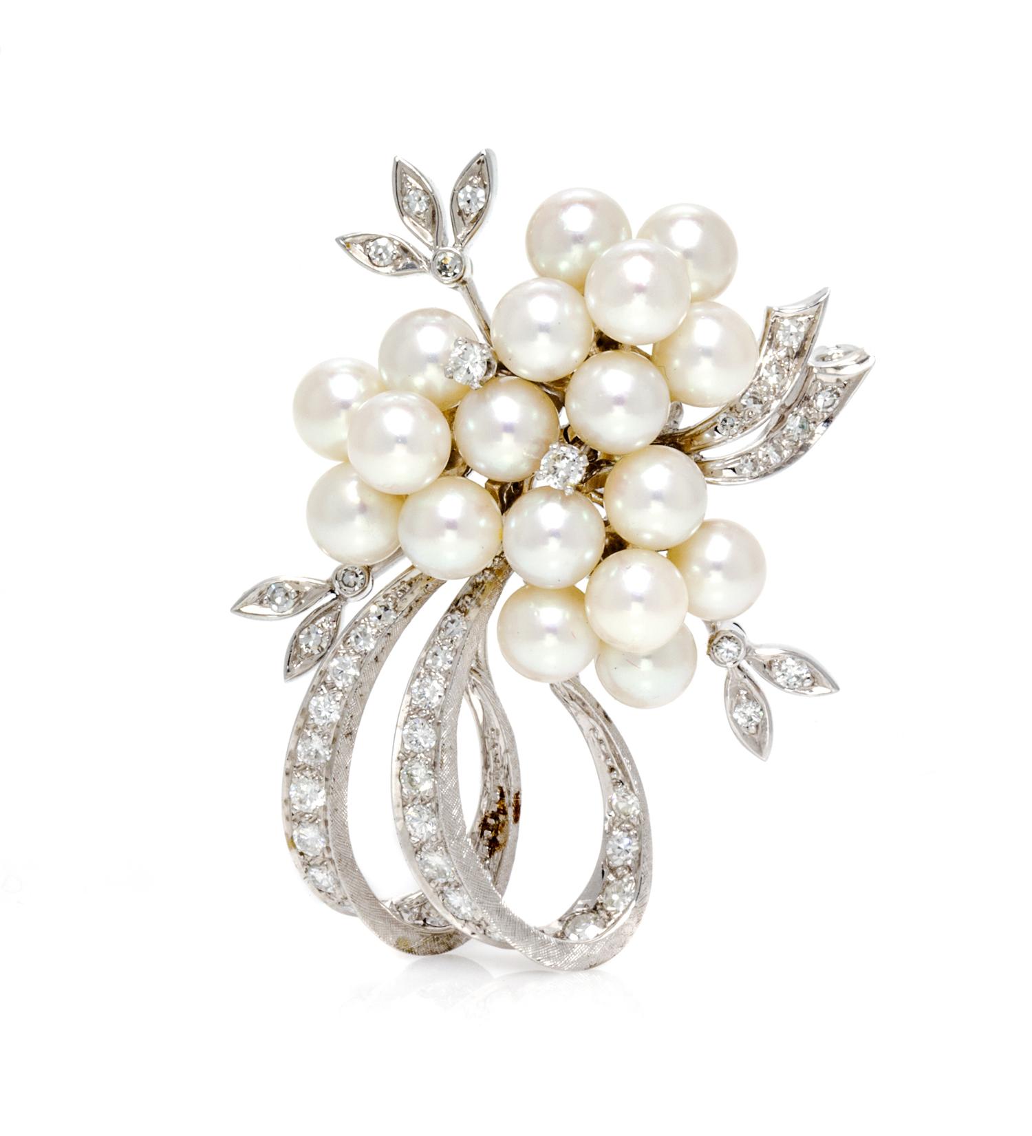 A White Gold, Cultured Pearl and Diamond Spray Brooch, 11.00 dwts.
