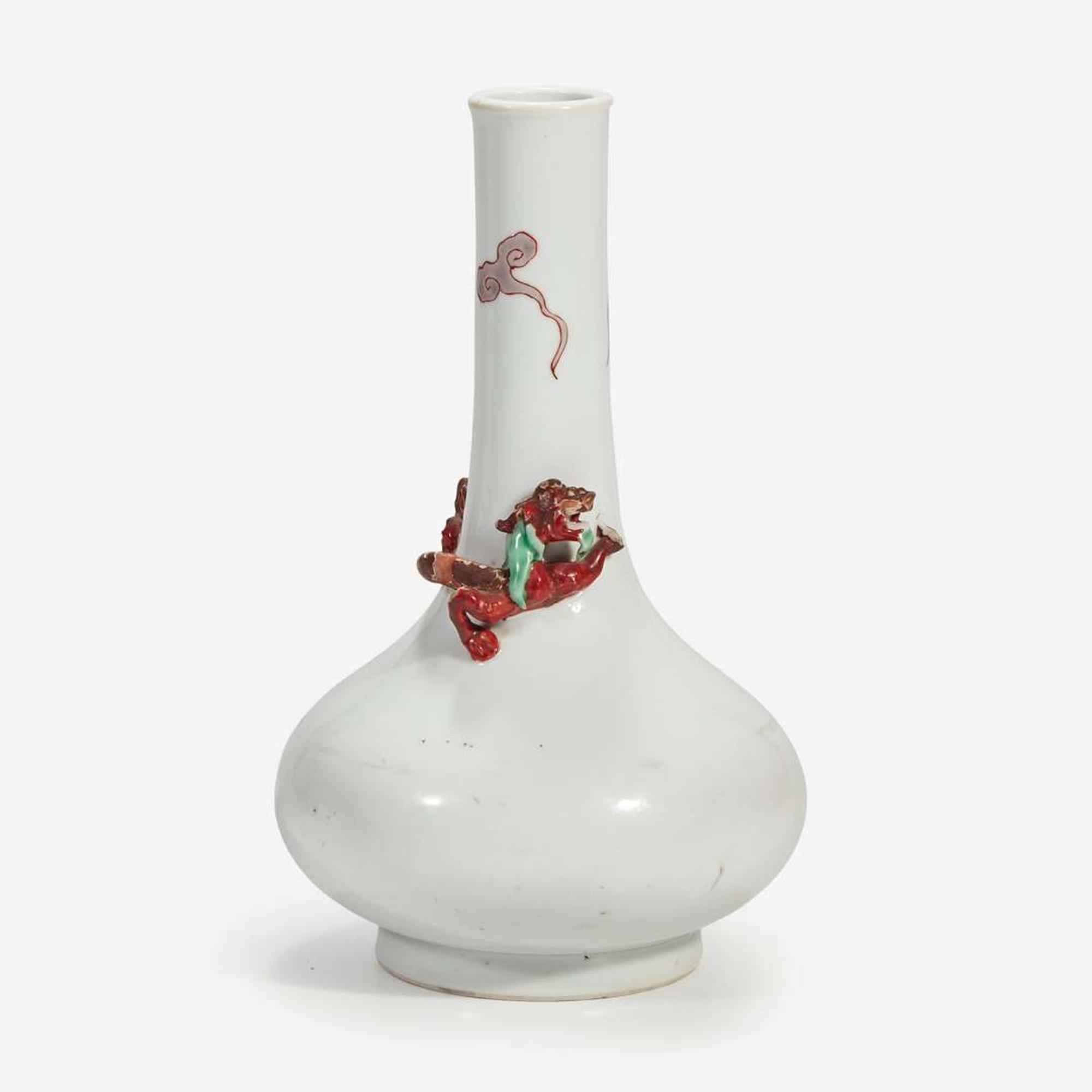 A Chinese porcelain bottle vase with applied coiled dragon Probably 18th century