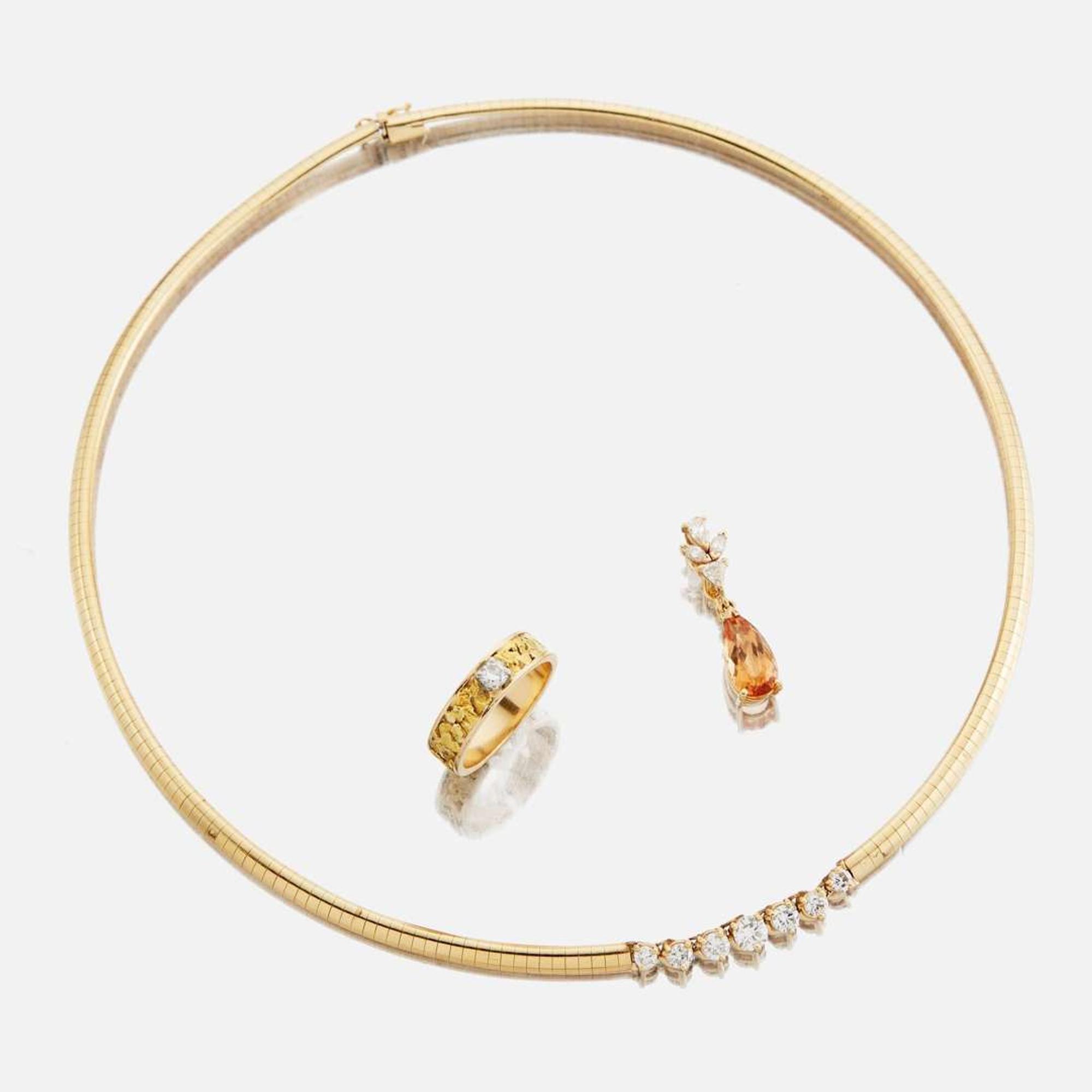 A collection of gold, diamond, and gem-set jewelry