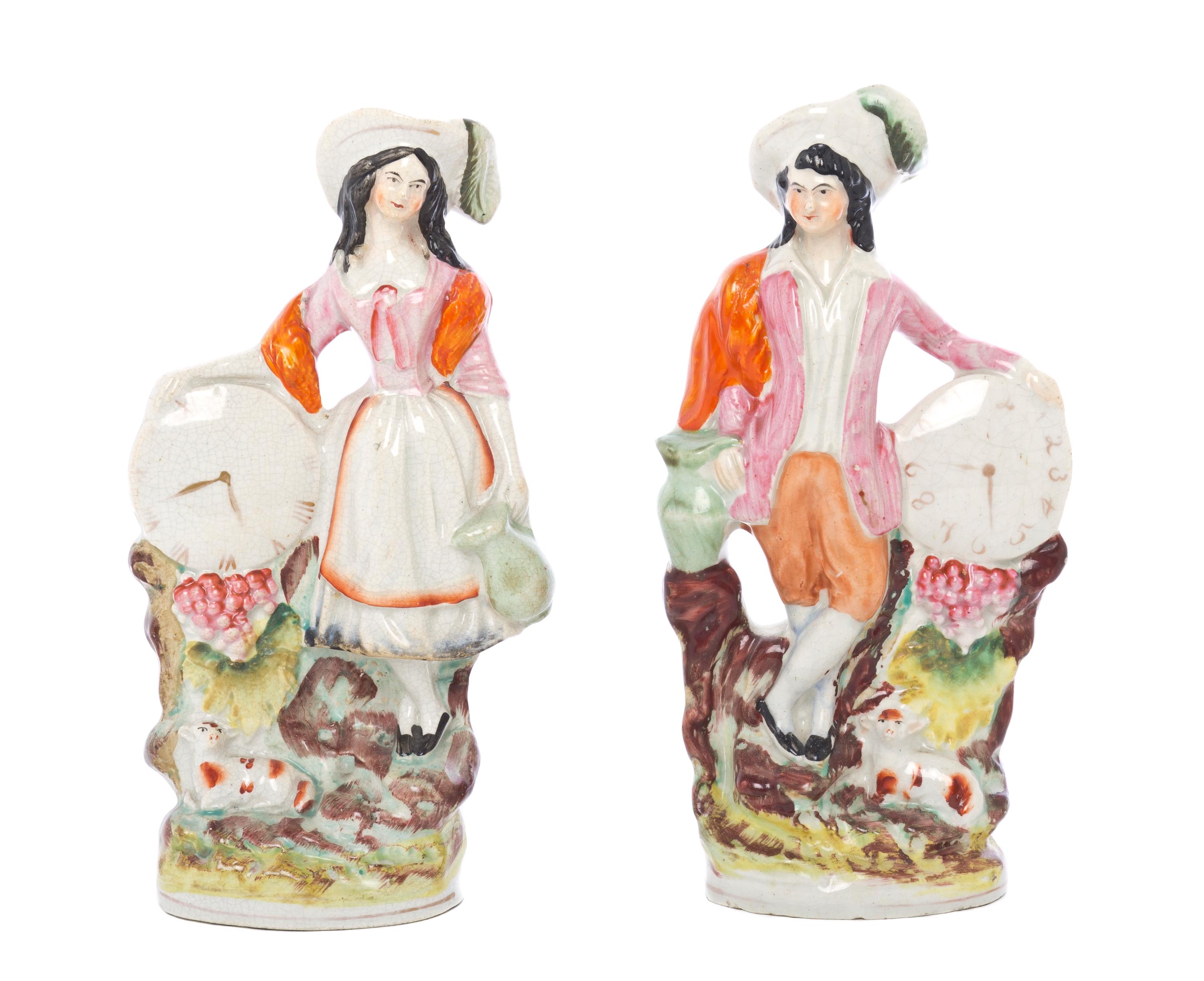 A Pair of Staffordshire Figures, Height 8 inches.